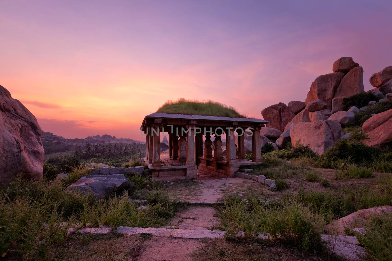 Ancient ruins of Hampi on sunset. India by dimol
