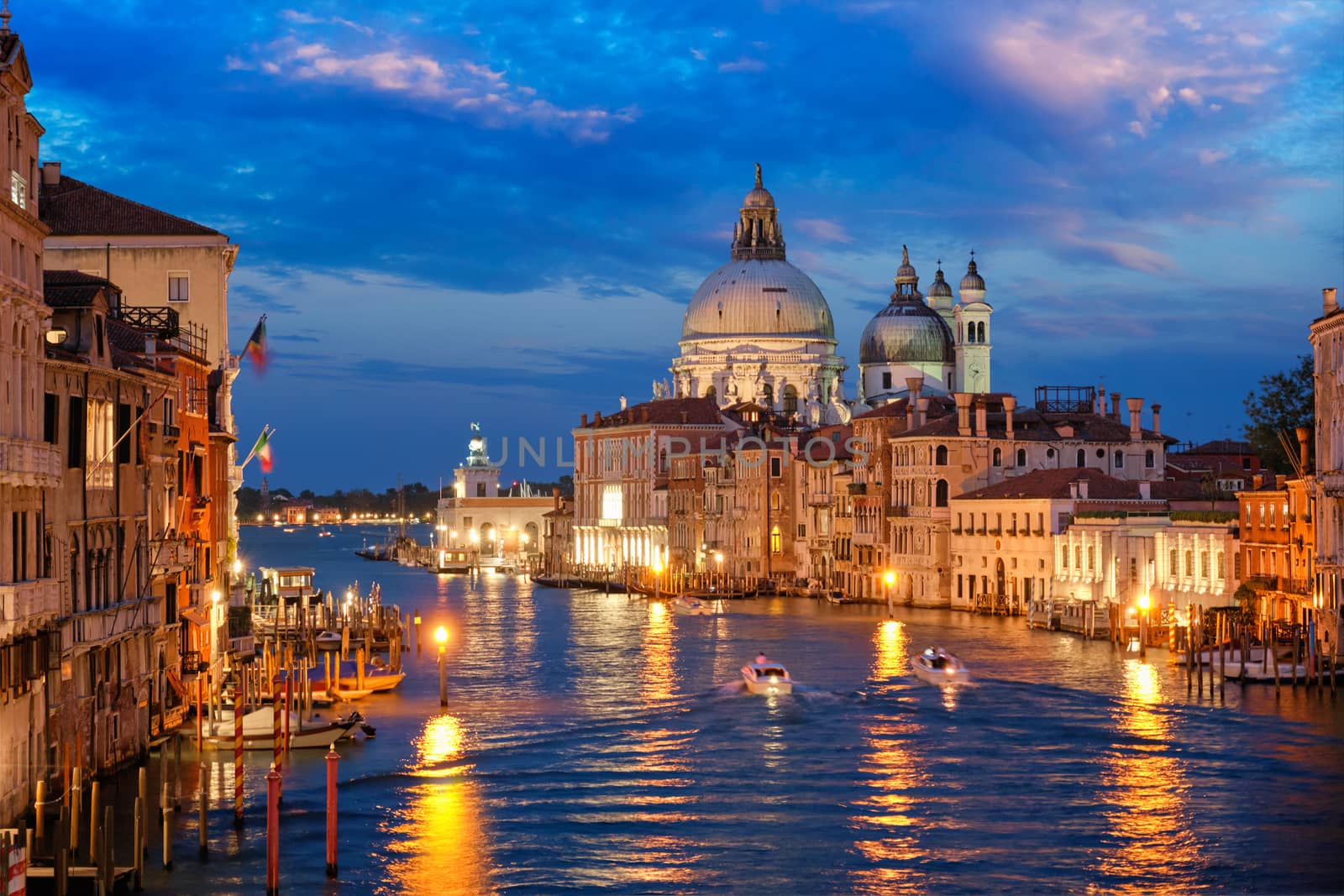 View of Venice Grand Canal and Santa Maria della Salute church in the evening by dimol