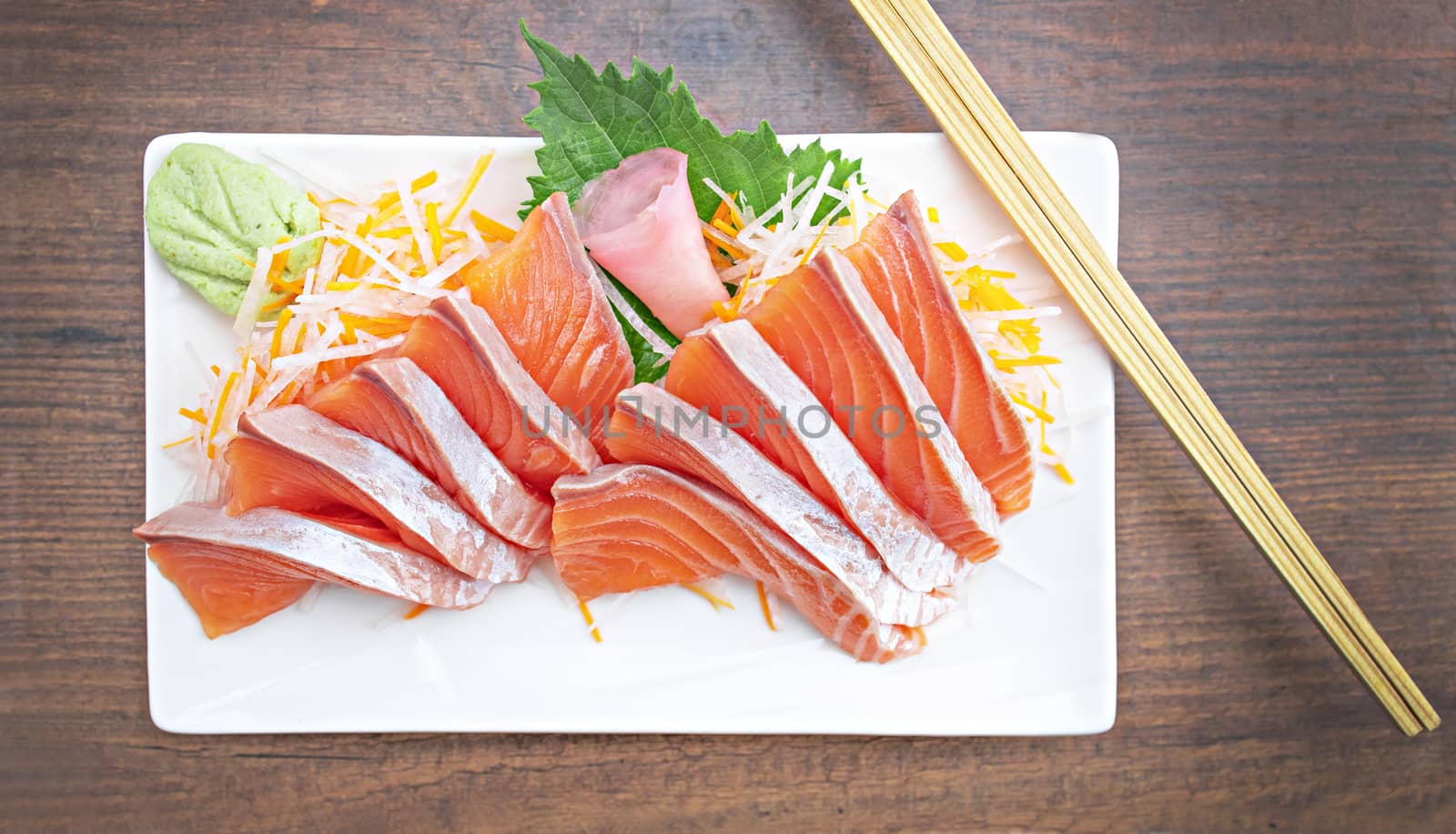 Top view Salmon Sashimi on table.  Japan food concept by Buttus_casso