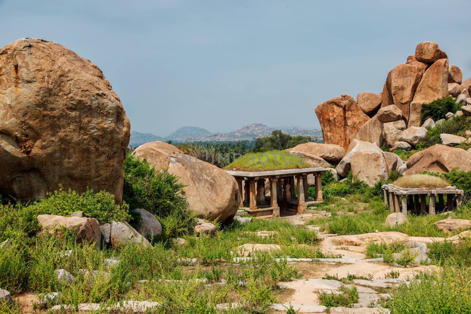 Ancient ruins in Hampi on sunset. Above Hampi Bazaar, Hampi, Karnataka, India