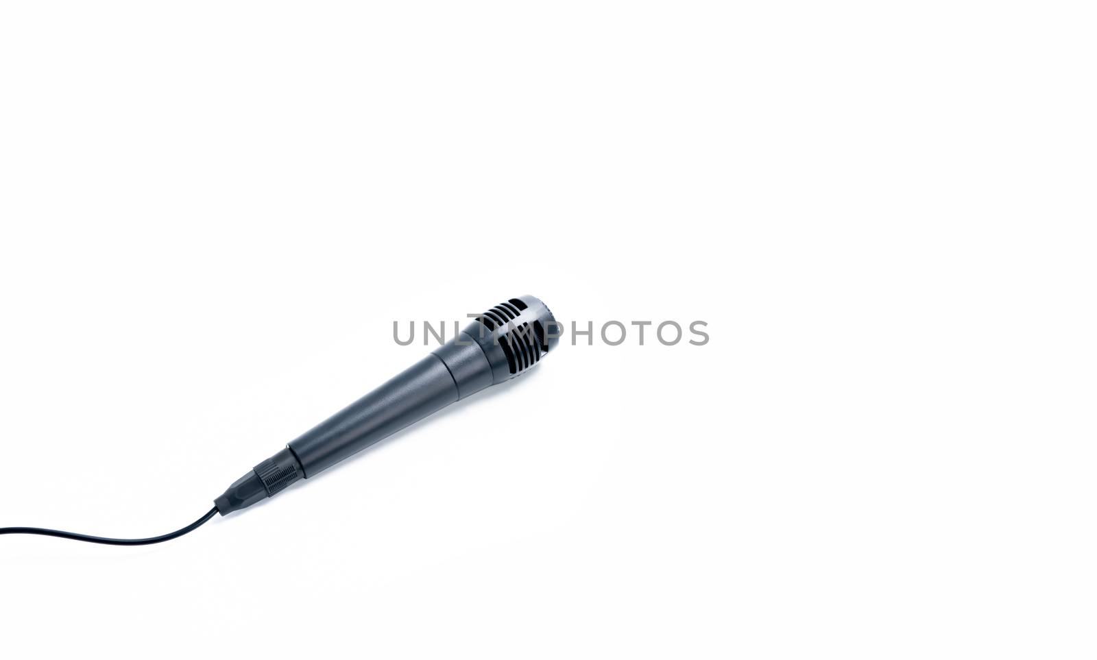 Black microphone on white background by Buttus_casso