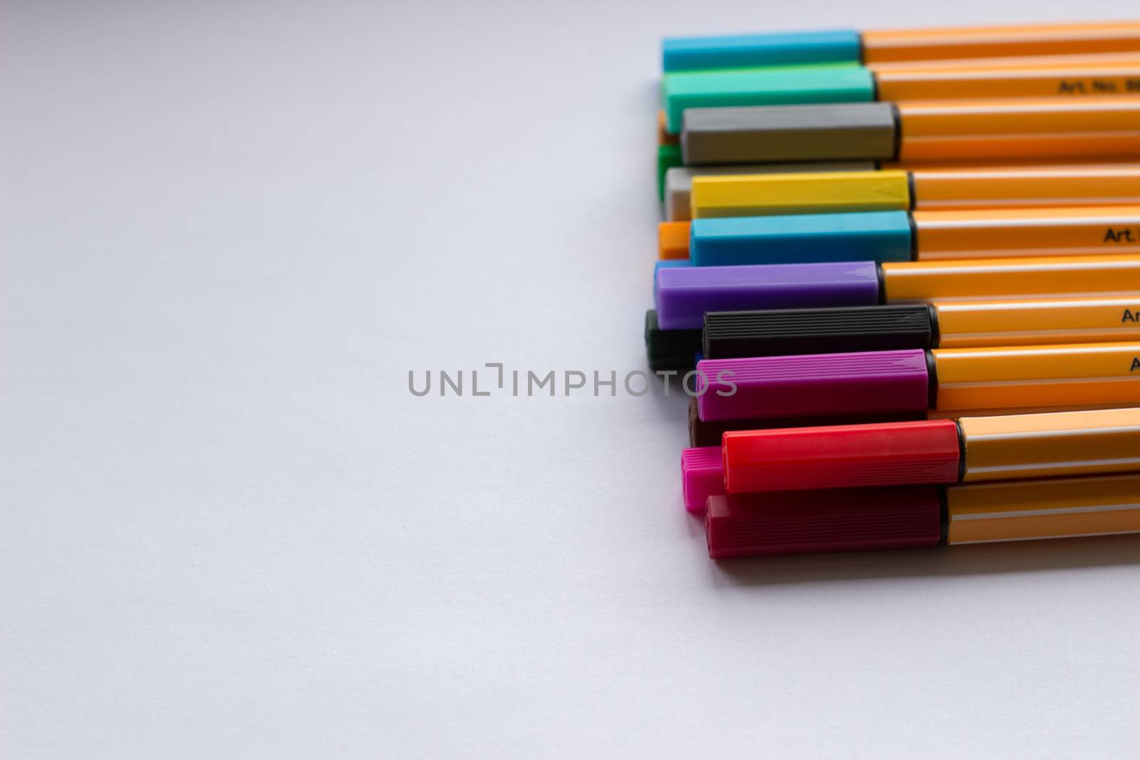 Many different colored pens. Color pencils isolated on a white background by AnatoliiFoto