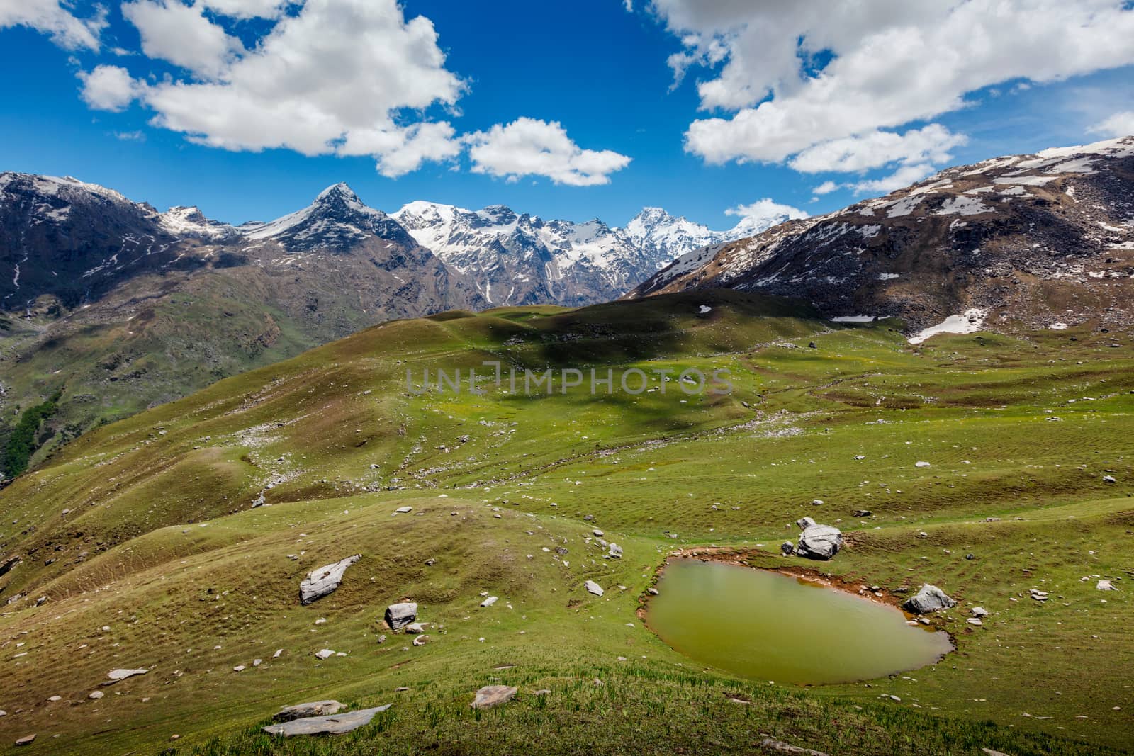 Scenic Indian Himalayan landscape scenery in Himalayas with small lake. Himachal Pradesh, India