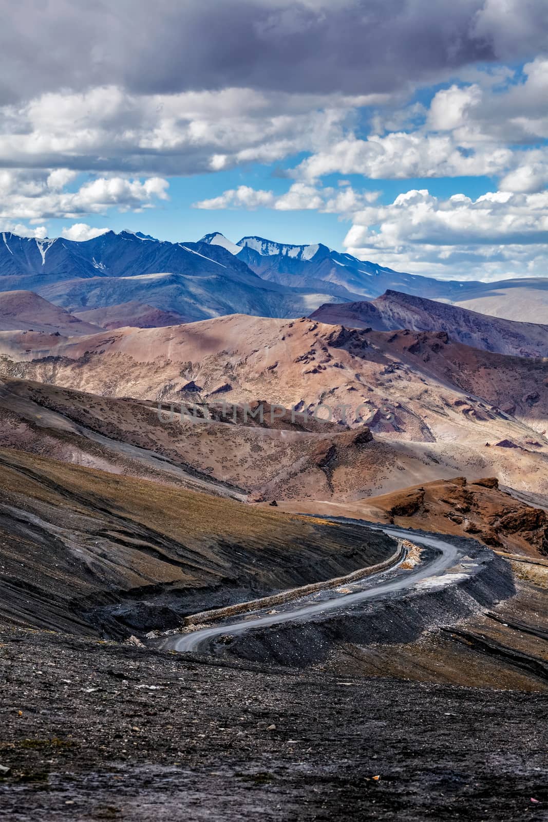 Manali-Leh Highway road from Himachal to Ladakh. Beautiful Indian Himalayan landscape is on the way from Kullu valley to Jammu and Kashmir state. Earthroad highway is more than 400 km. North India