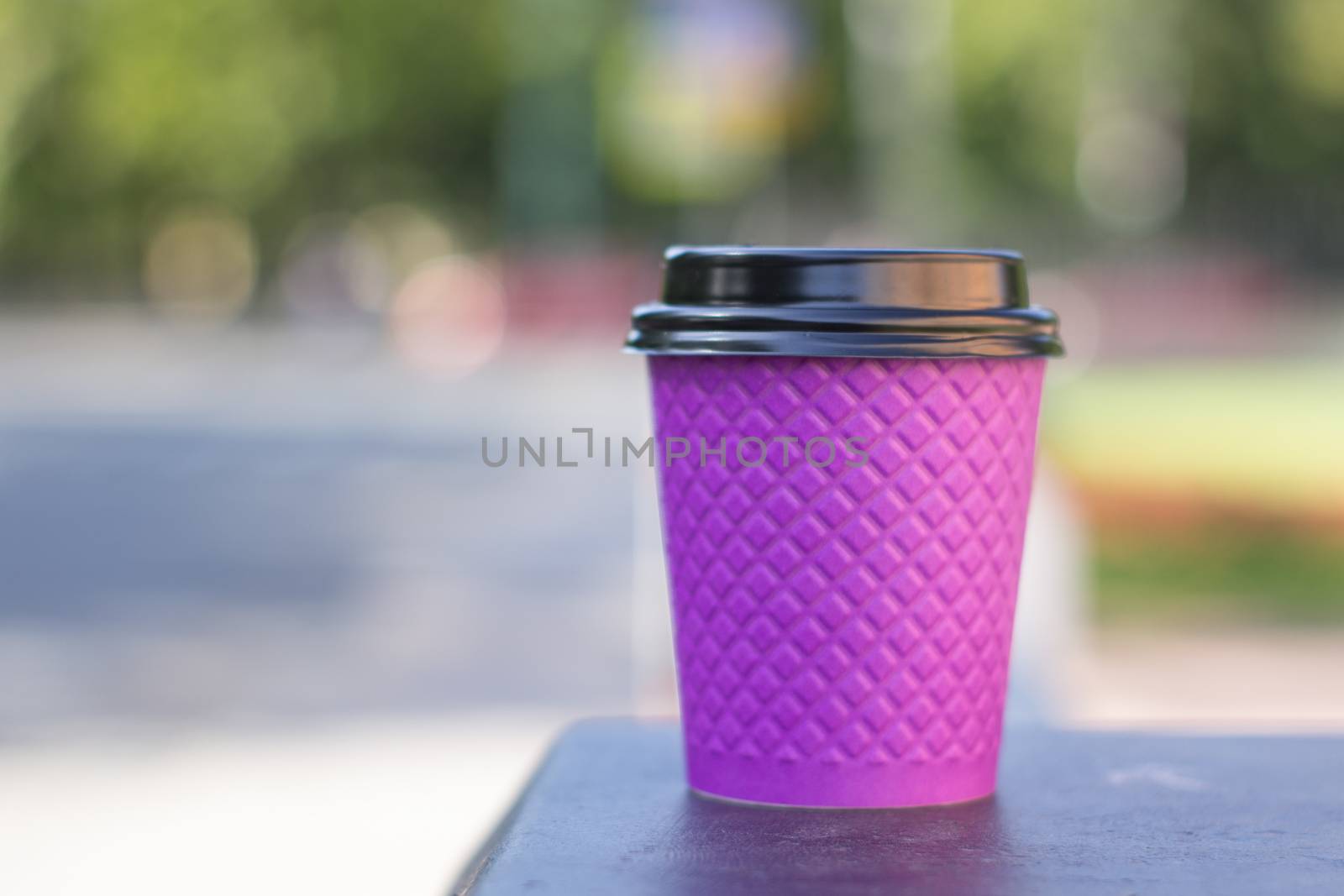 purple paper coffee Cup on the stove by AnatoliiFoto