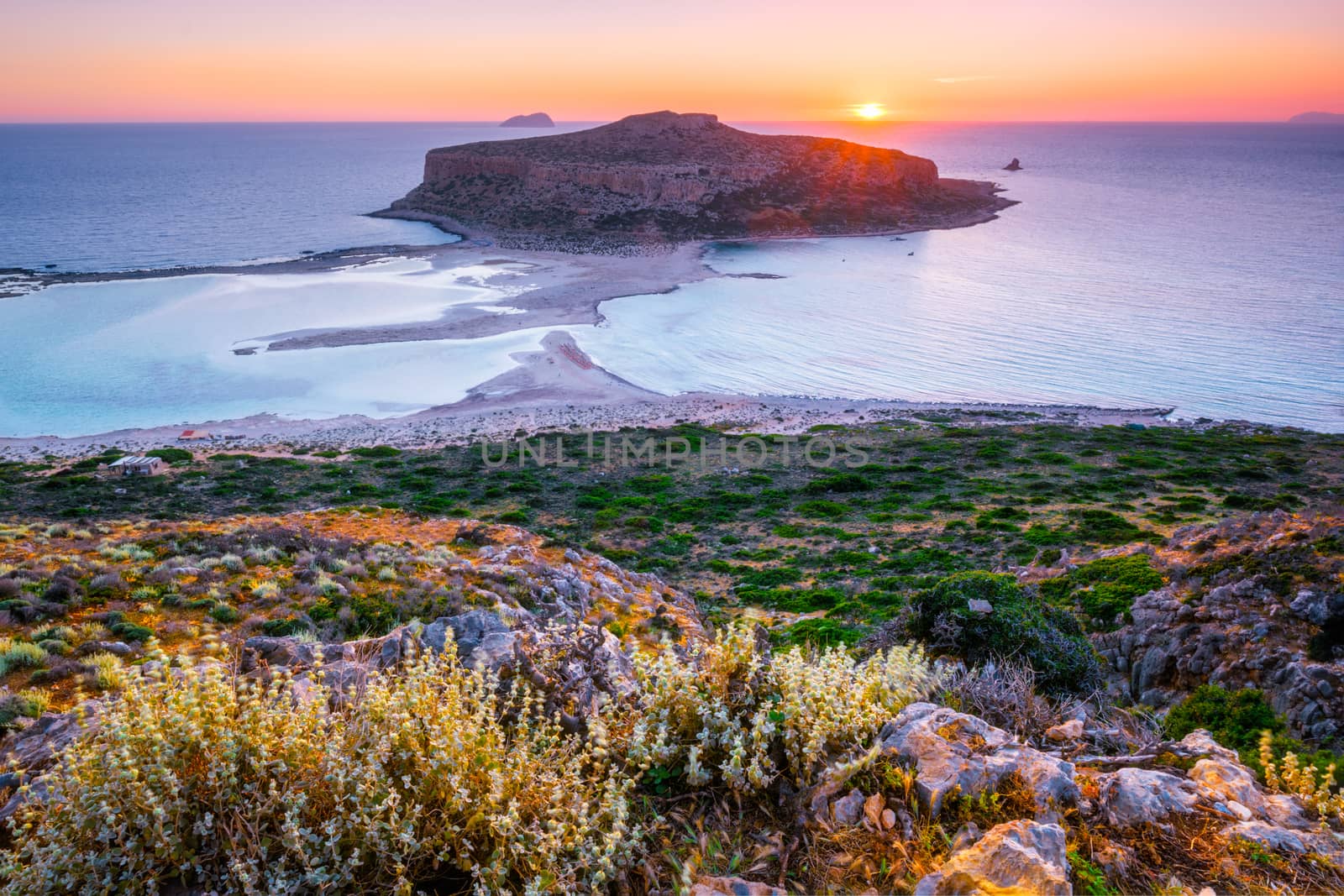 Island Gramvousa and the beautiful Balos beach on sunset in Crete island, Greece. Horizontal camera pan