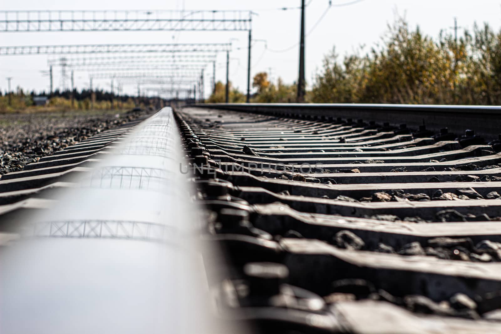 The railroad track closeup. The transport train by AnatoliiFoto