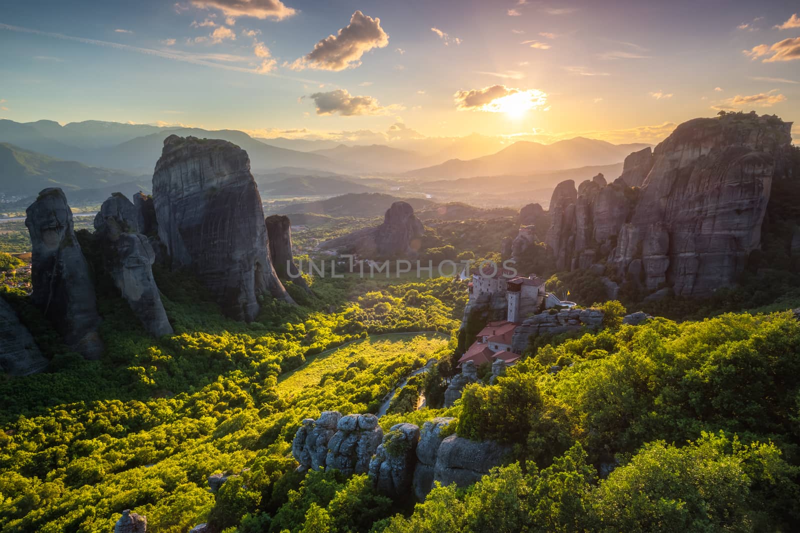 Sunset over monasteries of Meteora by dimol