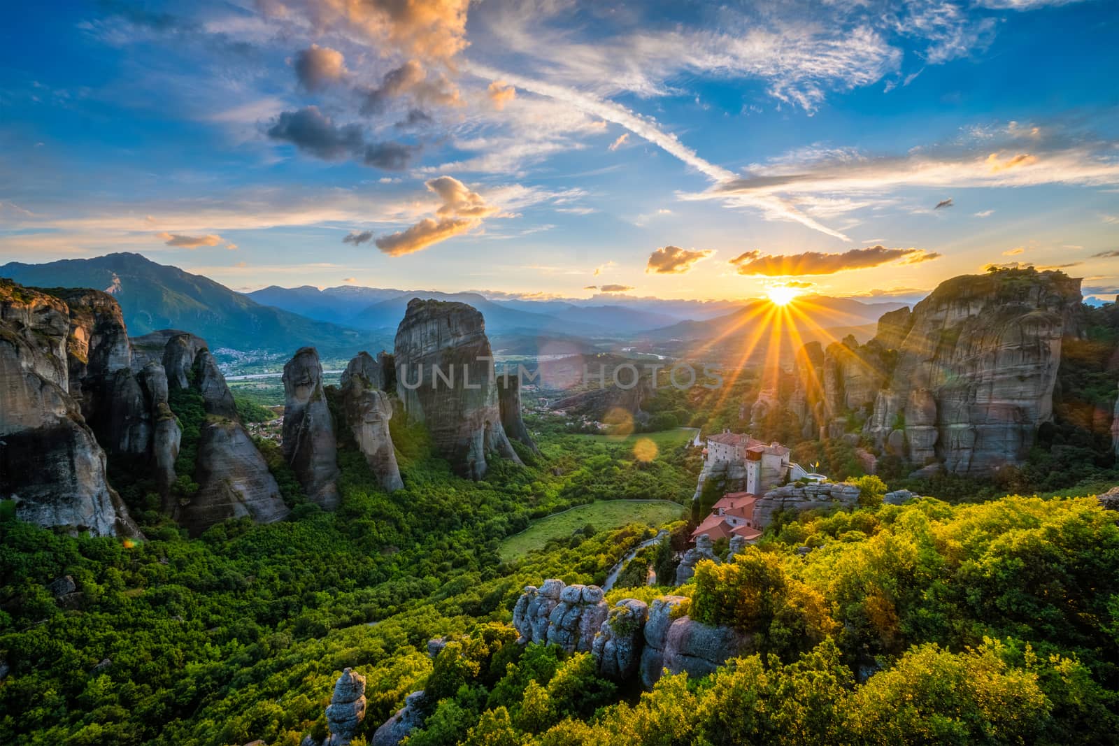 Sunset over monasteries of Meteora by dimol