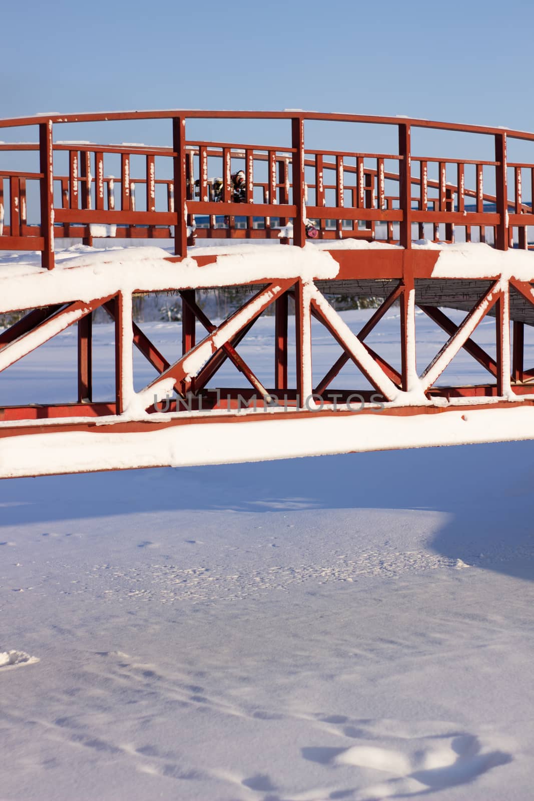 Fresh tracks from the tractor in the snow in winter. by AnatoliiFoto