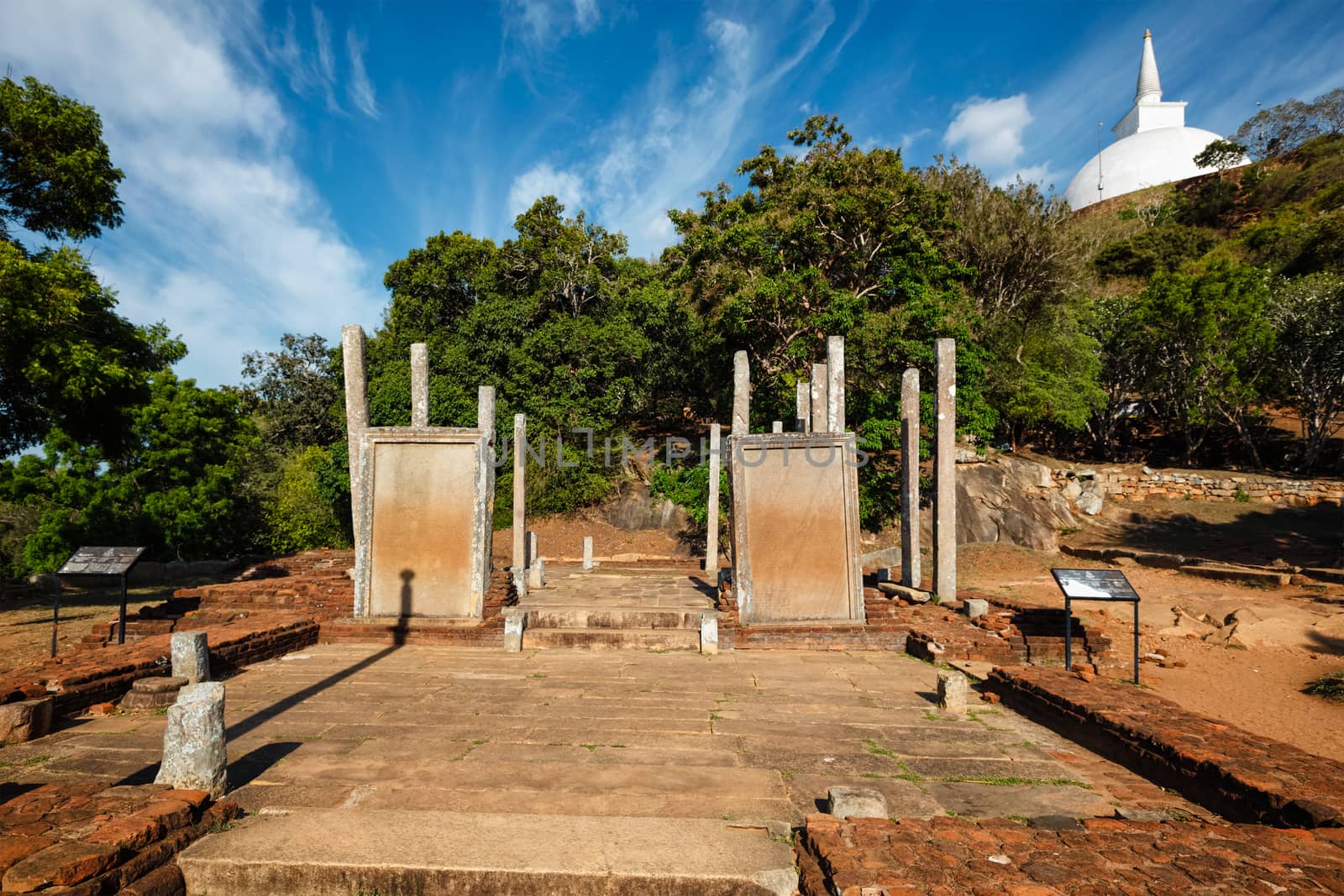 Relic house with Mihintale tablets, Mihintale, Sri Lanka. Ancient ruins pillars with inscriptions at Mahaseya Dagoba Buddhist monastery.