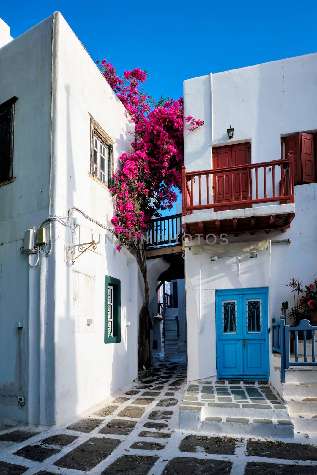 Mykonos Chora town street on Mykonos island, Greece by dimol