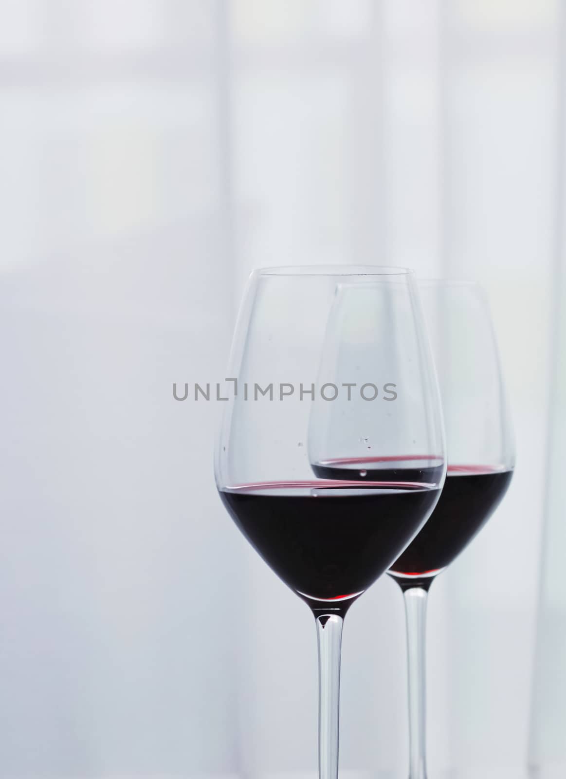 Two glasses of red wine, organic beverage product by Anneleven