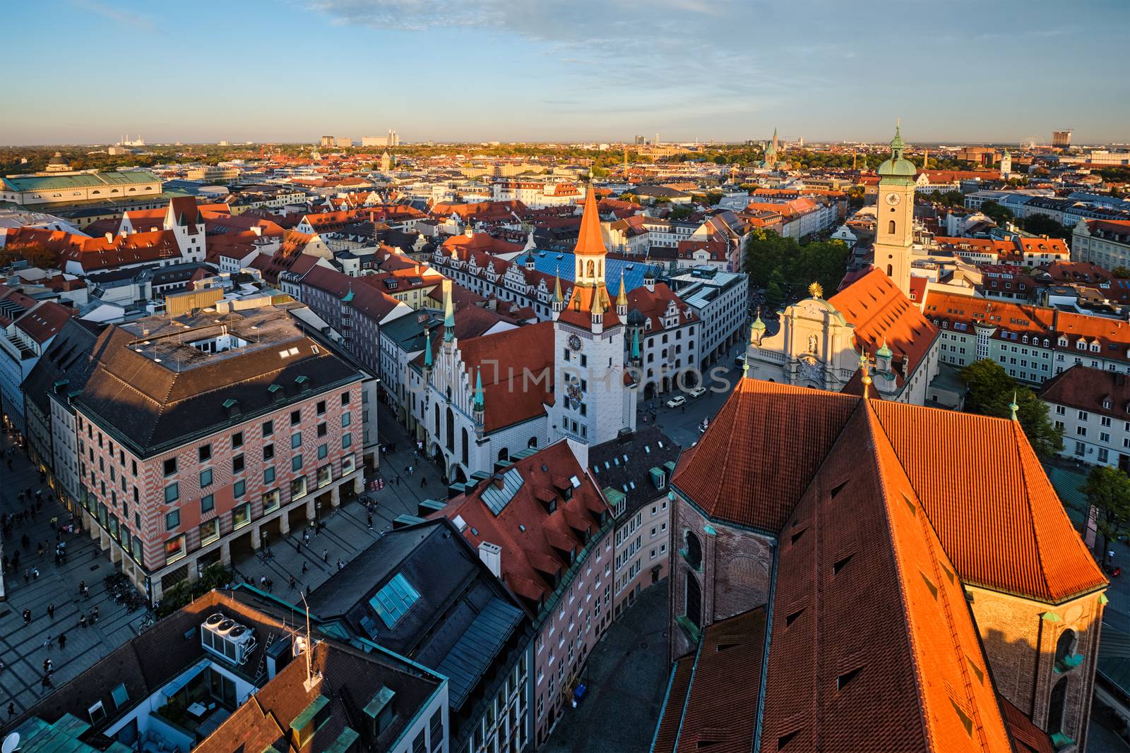 Aerial view of Munich - Marienplatz and Altes Rathaus from St. Peter's church on sunset. Munich, Germany