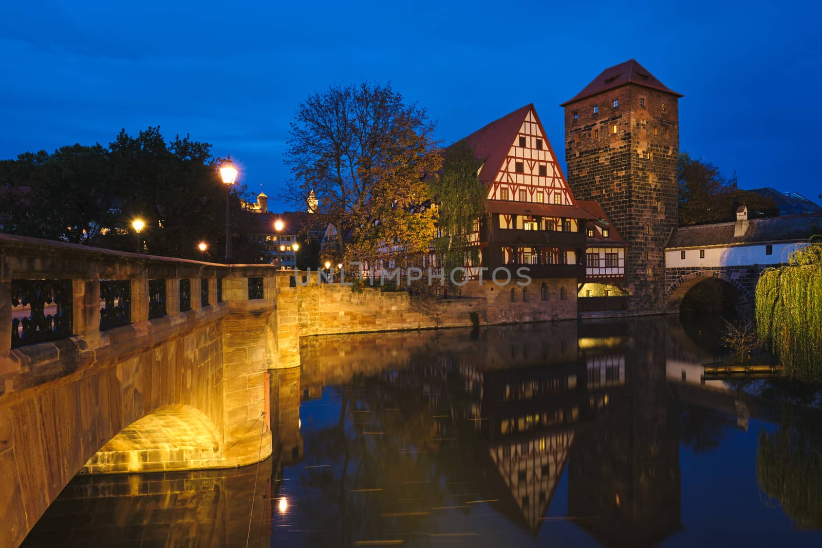 Nuremberg city houses on riverside of Pegnitz river from Maxbrucke (Max bridge). Nuremberg, Franconia, Bavaria, Germany