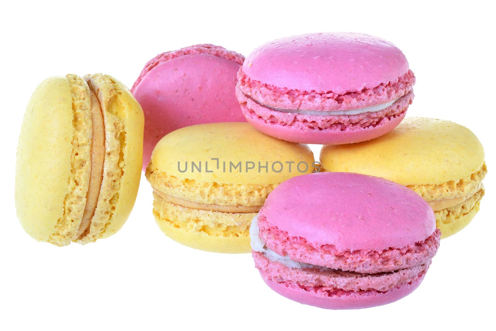 Pink strawberry and peach macarons isolated on white background