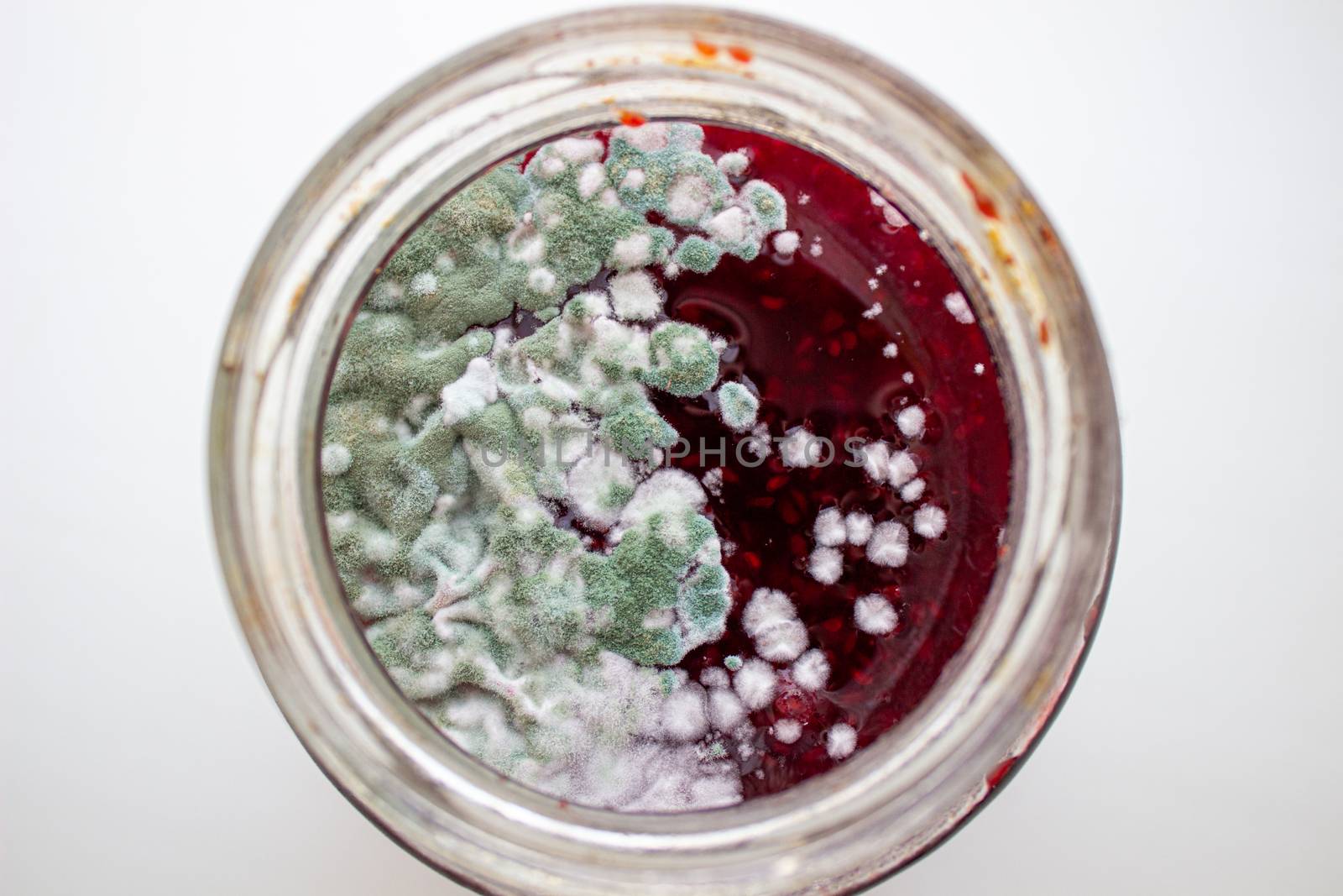 Mold in a jar of jam. Hazardous to health. Mold