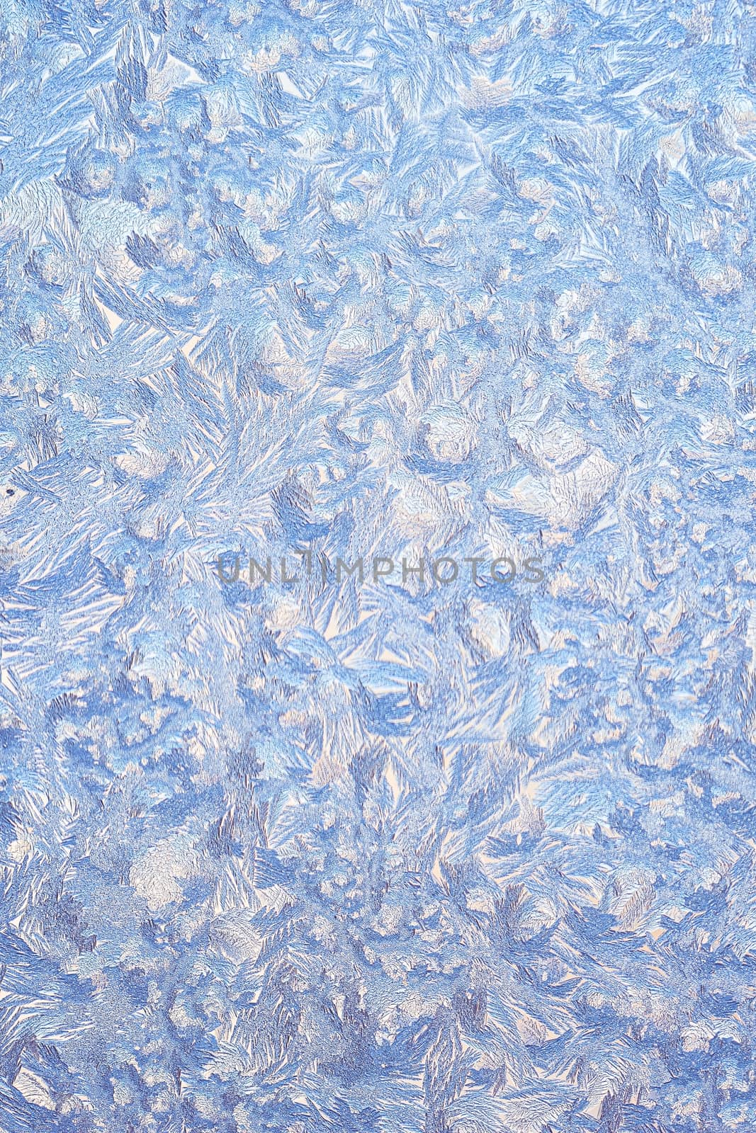Frosty natural pattern on winter window glass 