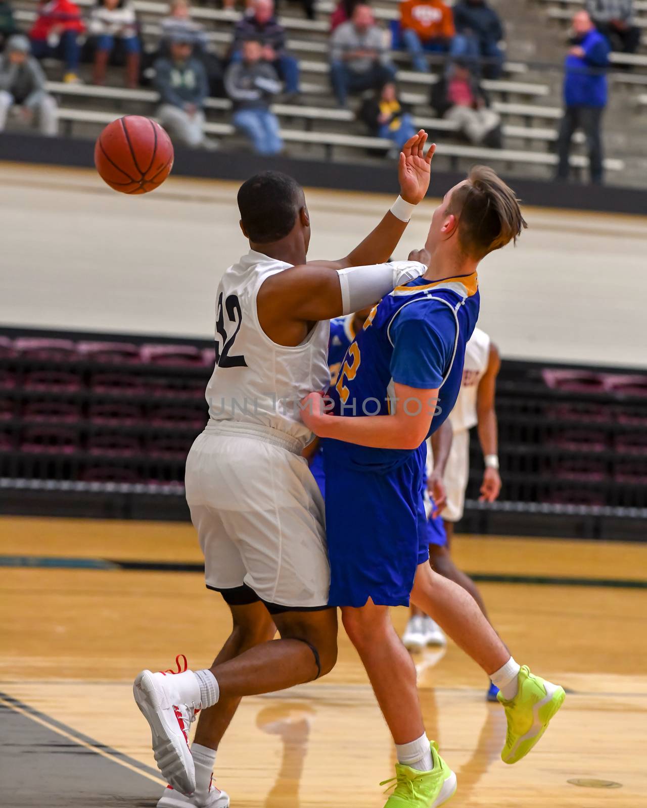 Young athletes making great basketball plays during a game. Slam Dunks and layups