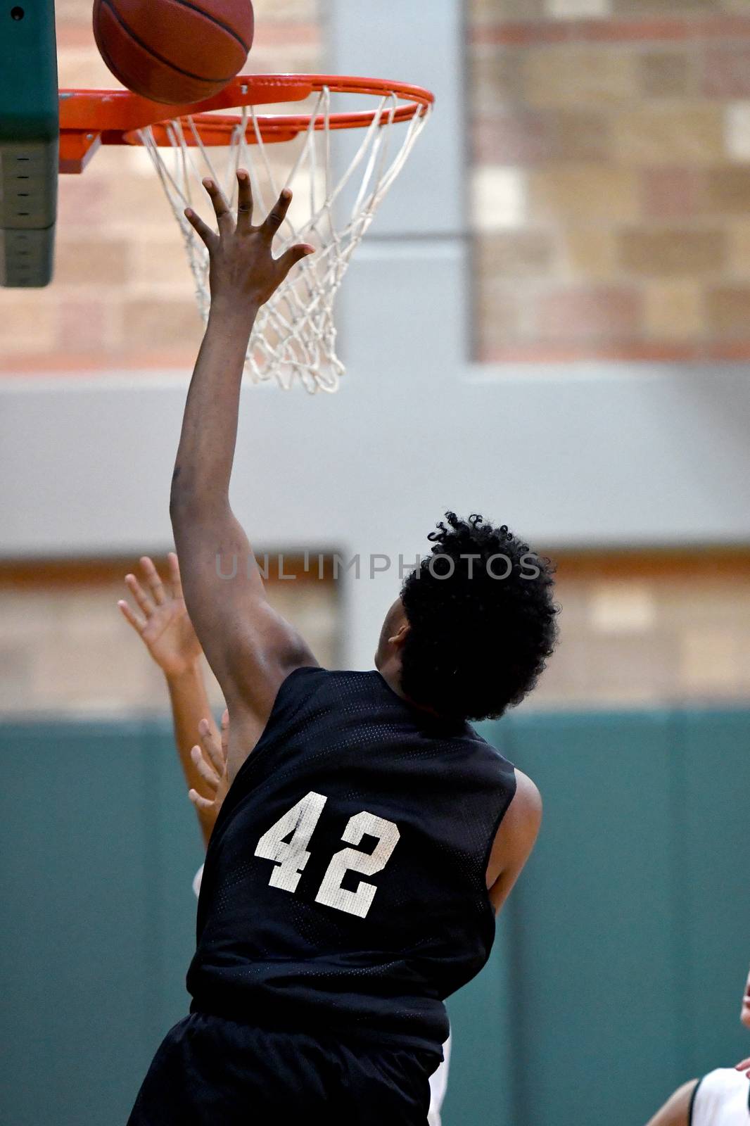 Basketball Players Making Spectacular Plays by Calomeni