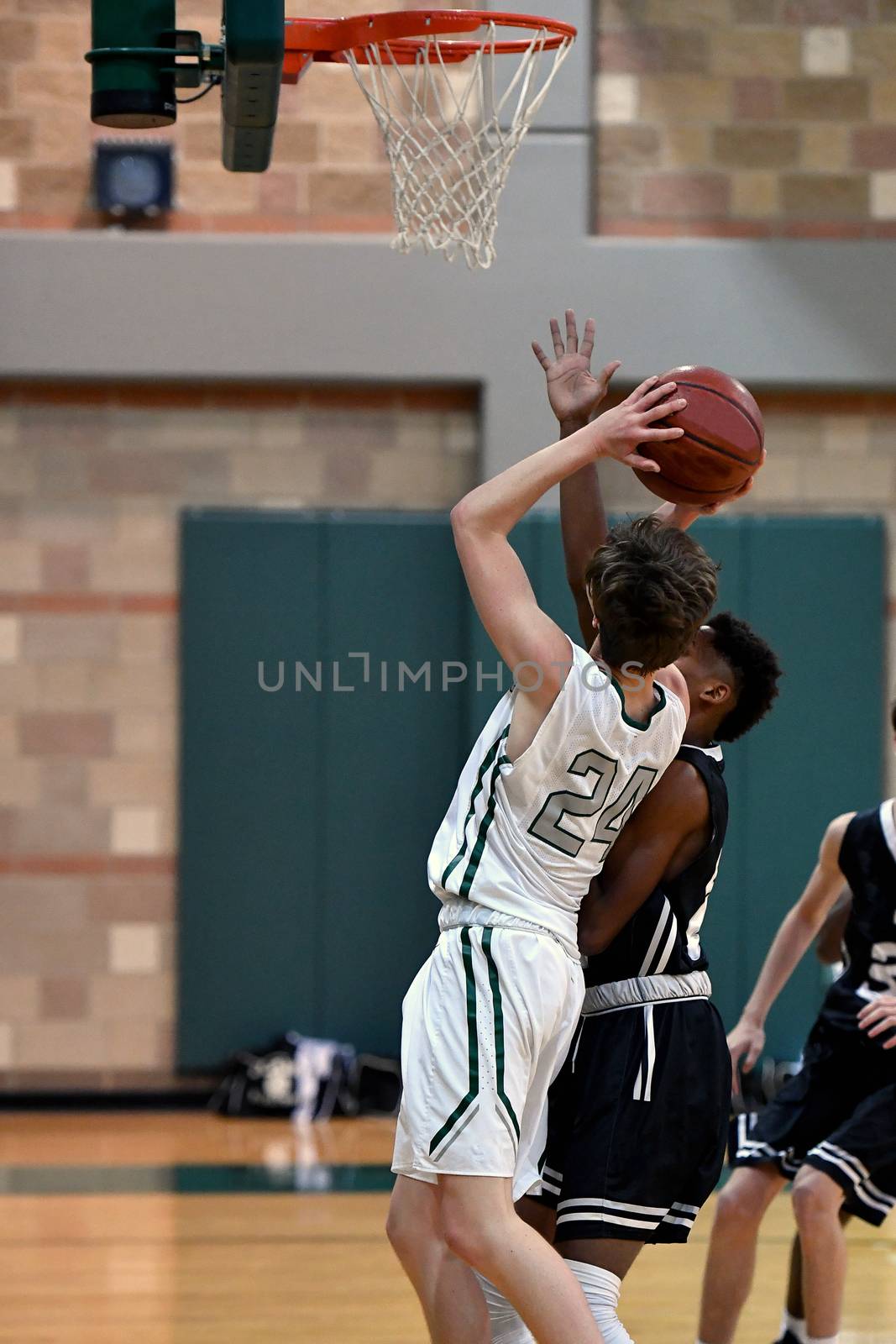 Basketball Players Making Spectacular Plays by Calomeni