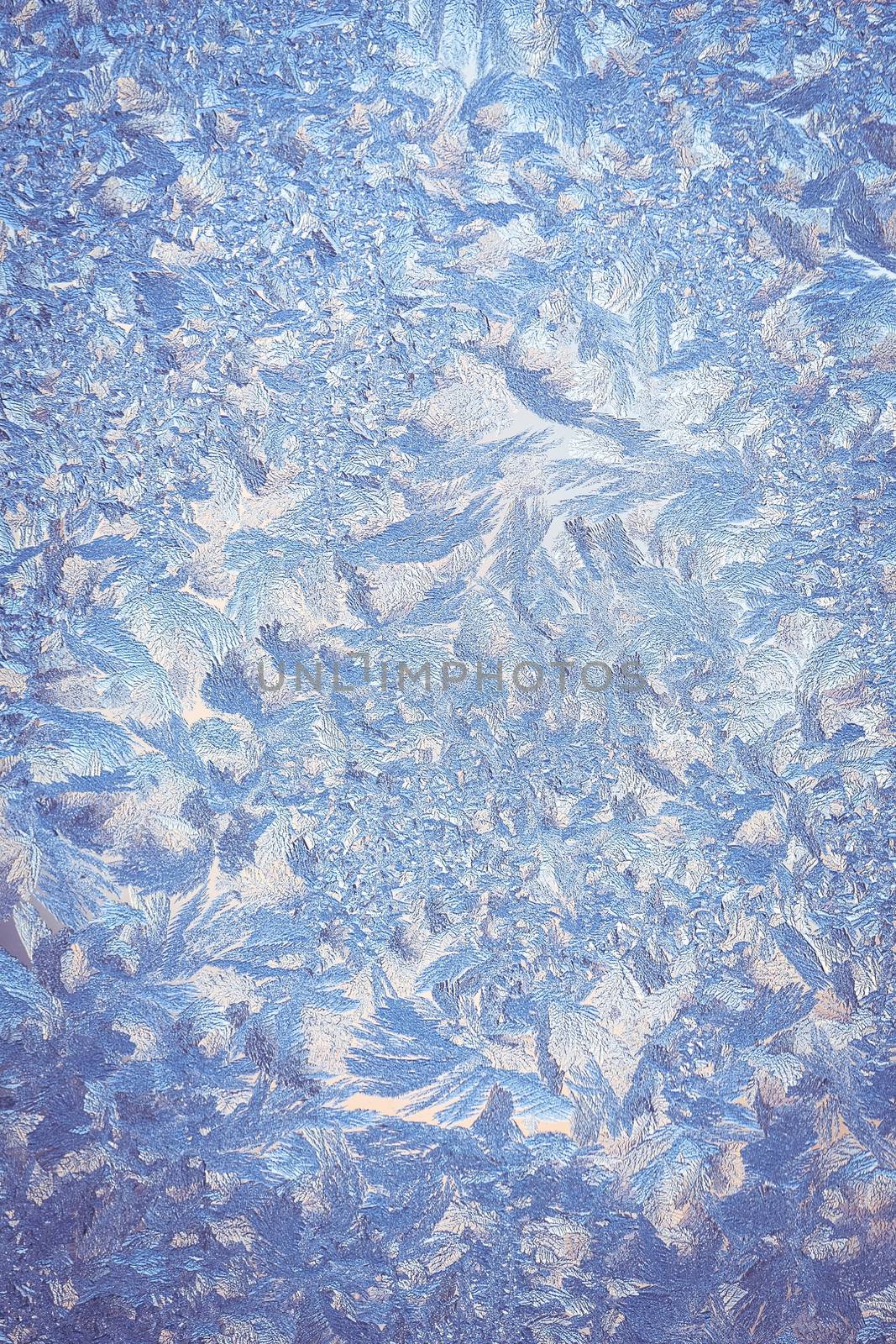 Frosty natural pattern on winter window glass 
