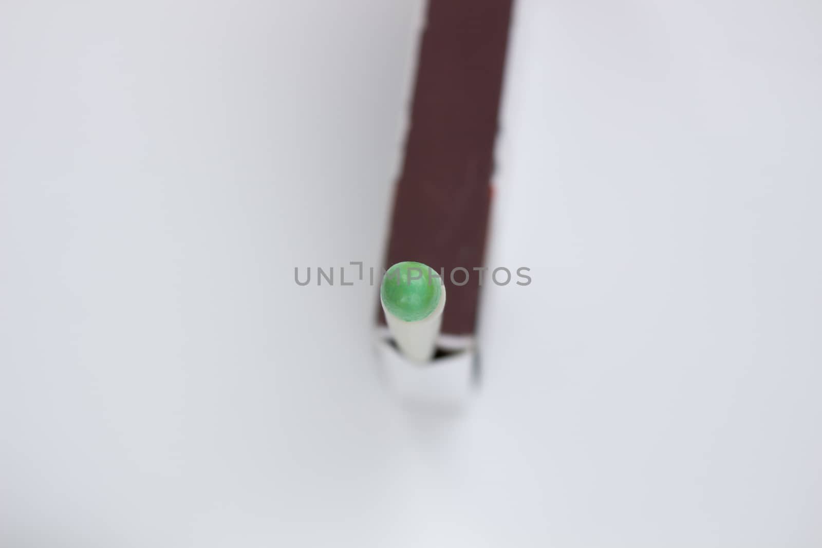 Hunting waterproof matches in a paper box isolated on white background.