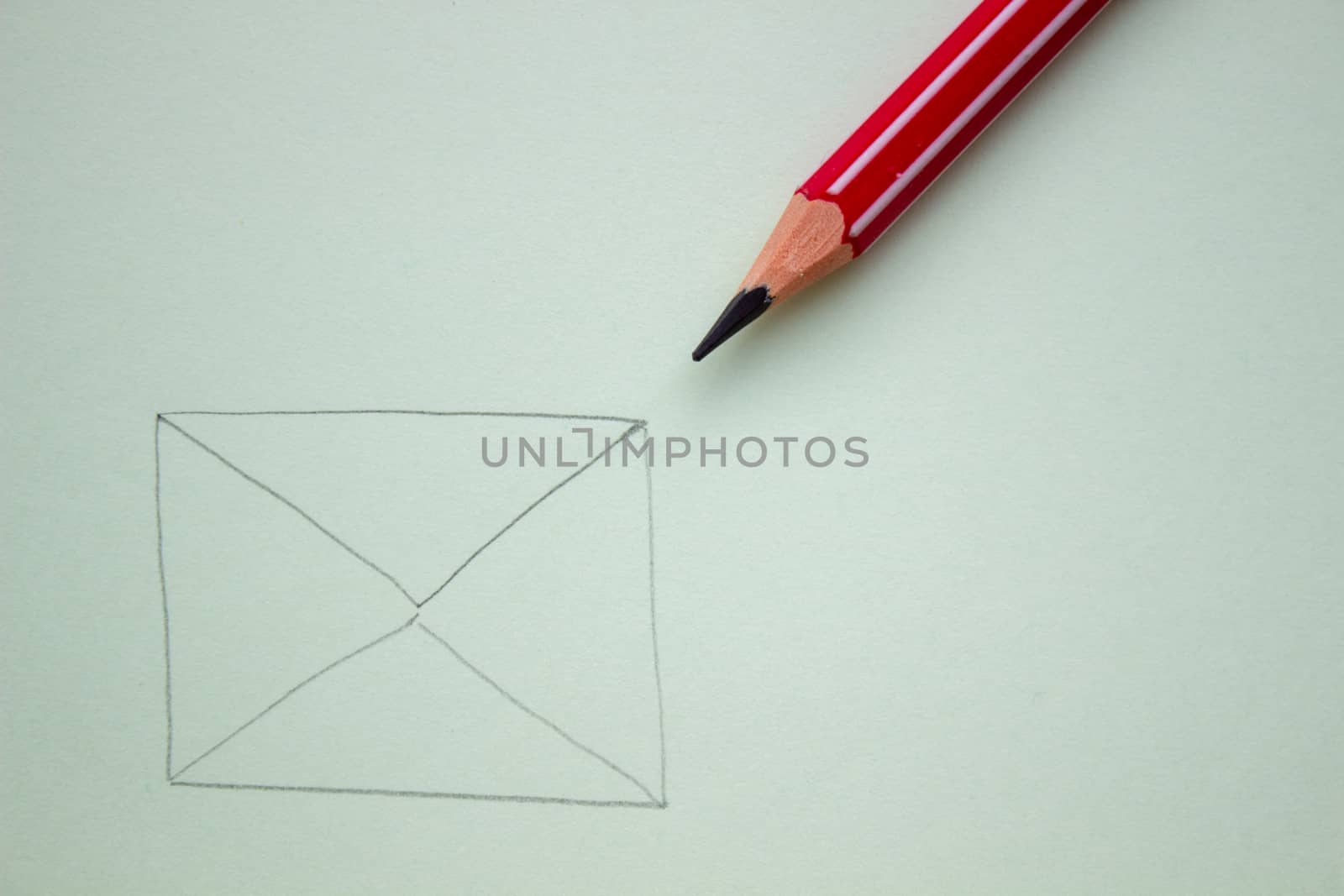 An envelope drawn in pencil on a paper sheet, Close-up. by AnatoliiFoto