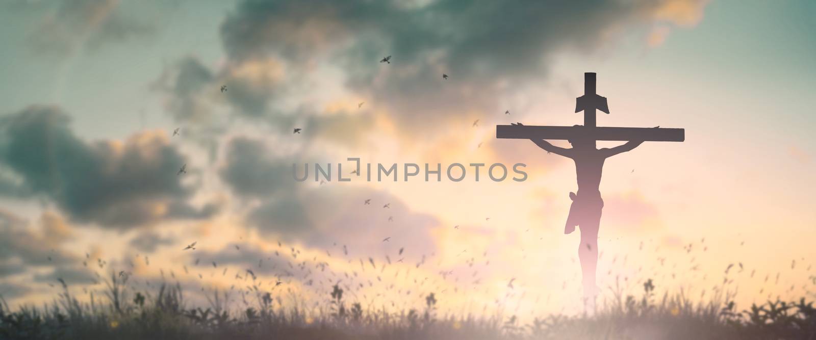 Silhouette jesus christ crucifix on cross on calvary sunset background concept for good friday he is risen in easter day, good friday jesus death on crucifix, world christian and holy spirit religious.