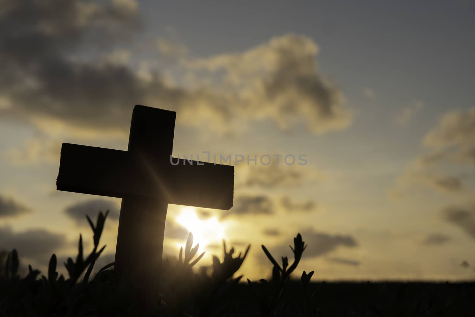 Silhouette Jesus christ death on cross crucifixion on calvary hill in sunset good friday risen in easter day concept for Christian praise for holy spirit religious God, Catholic praying background.