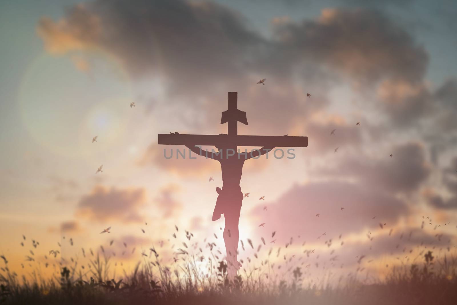 Silhouette Jesus christ death on cross crucifixion on calvary hill in sunset good friday risen in easter day concept for Christian praise for holy spirit religious God, Catholic praying background.