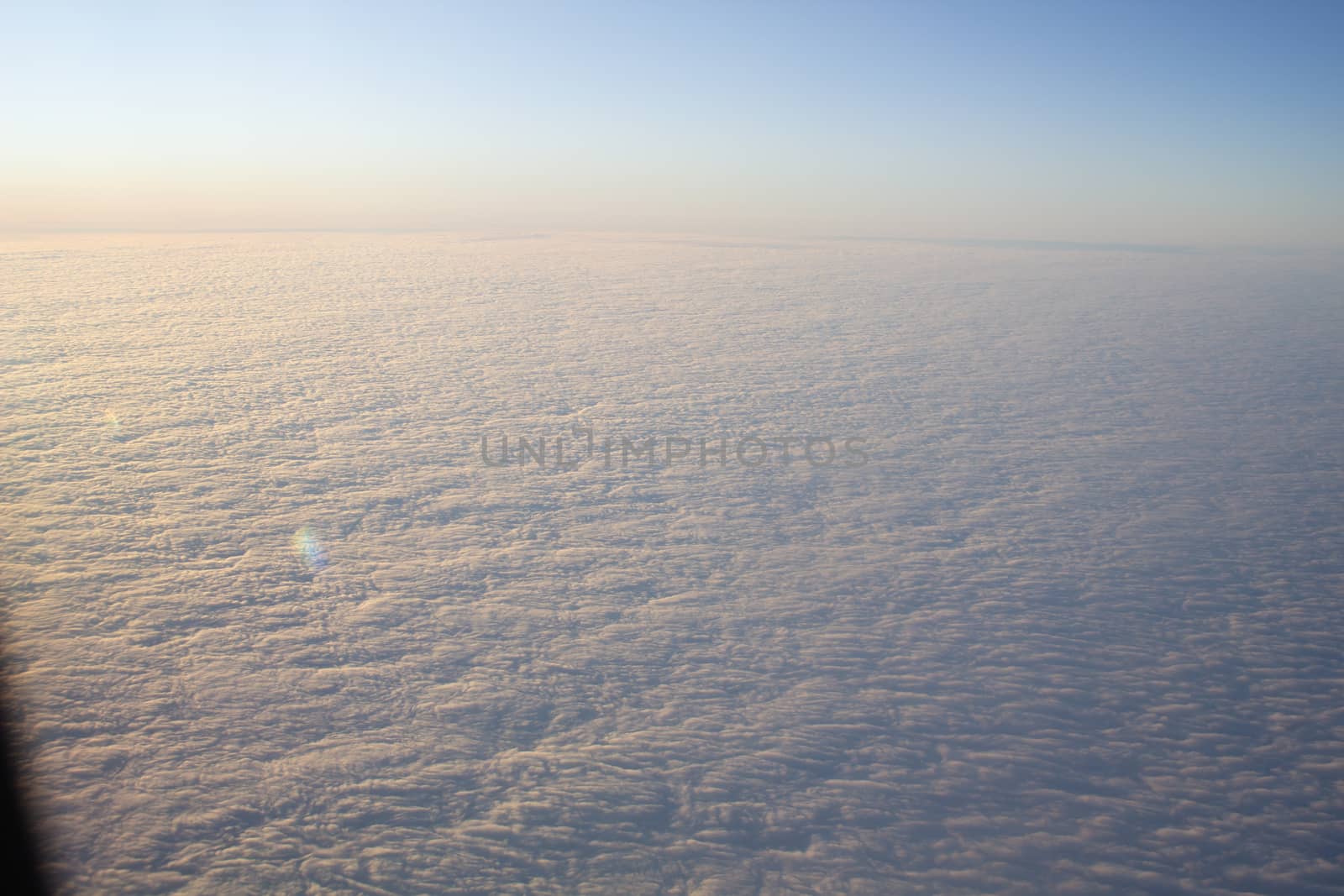 Wide cloud landscape aerial view from a plane.