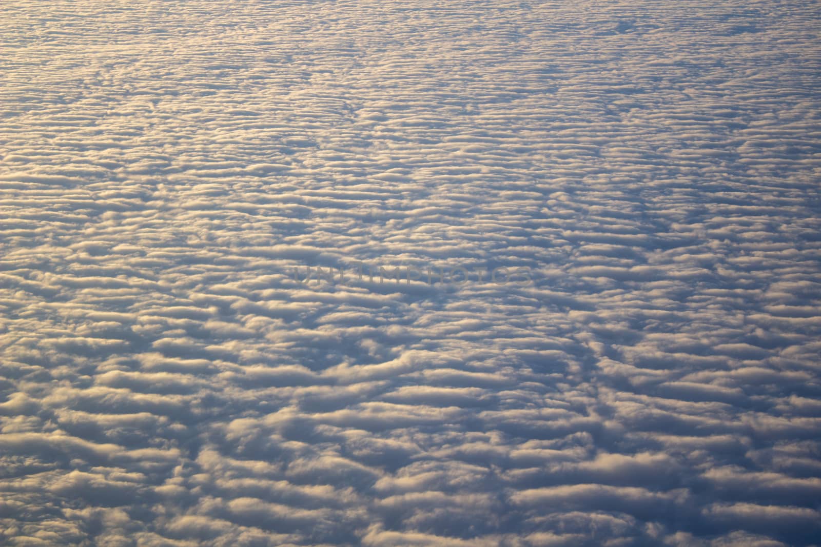 Wide cloud landscape aerial view from a plane.