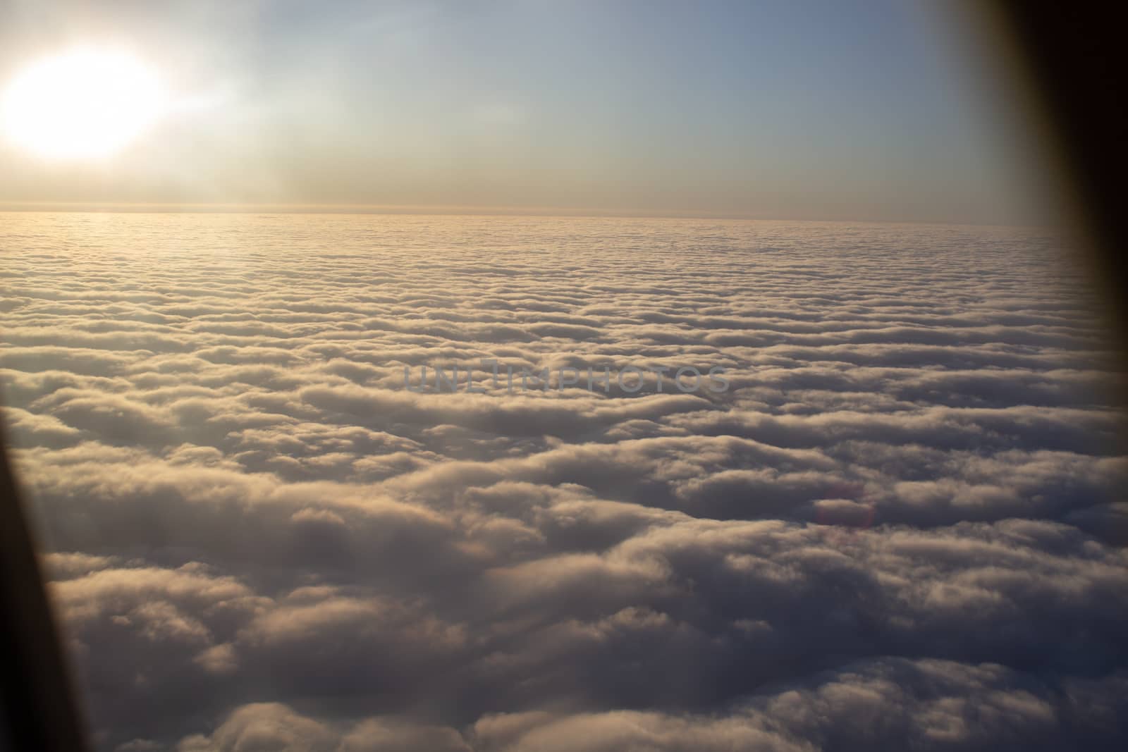 Wide cloud landscape aerial view from a plane.