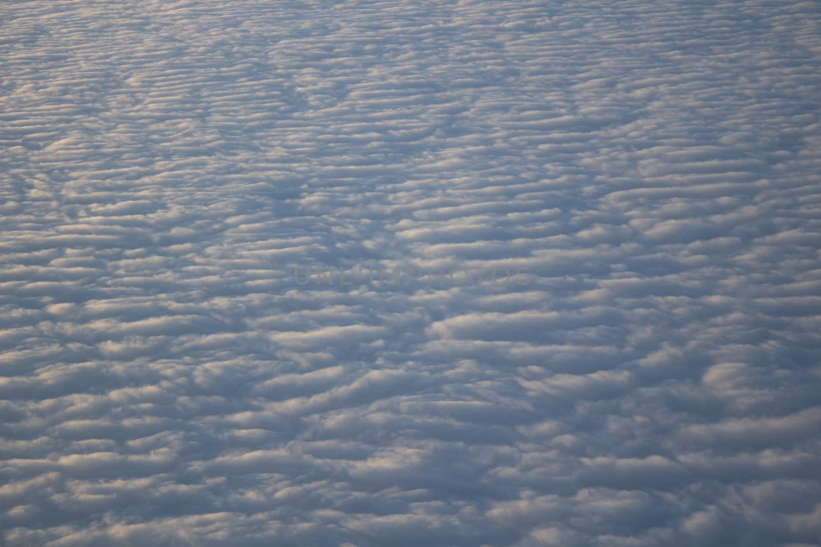 Wide cloud landscape aerial view from a plane.