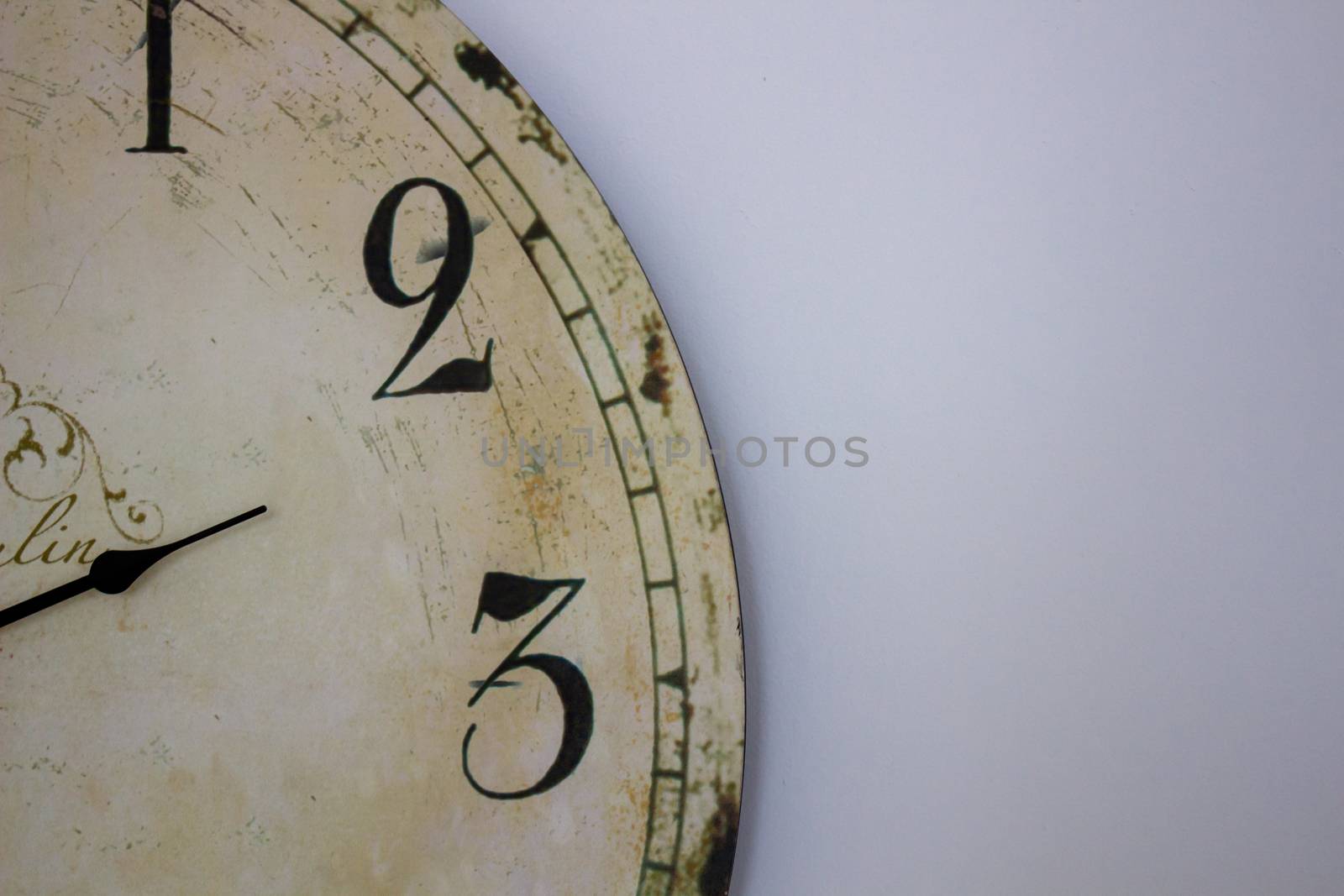 Midday Midnight Rustic Parchment Website Banner - Wide background of stone colored parchment effect with a partial fading clock face on left side and plenty of copy space on right side..