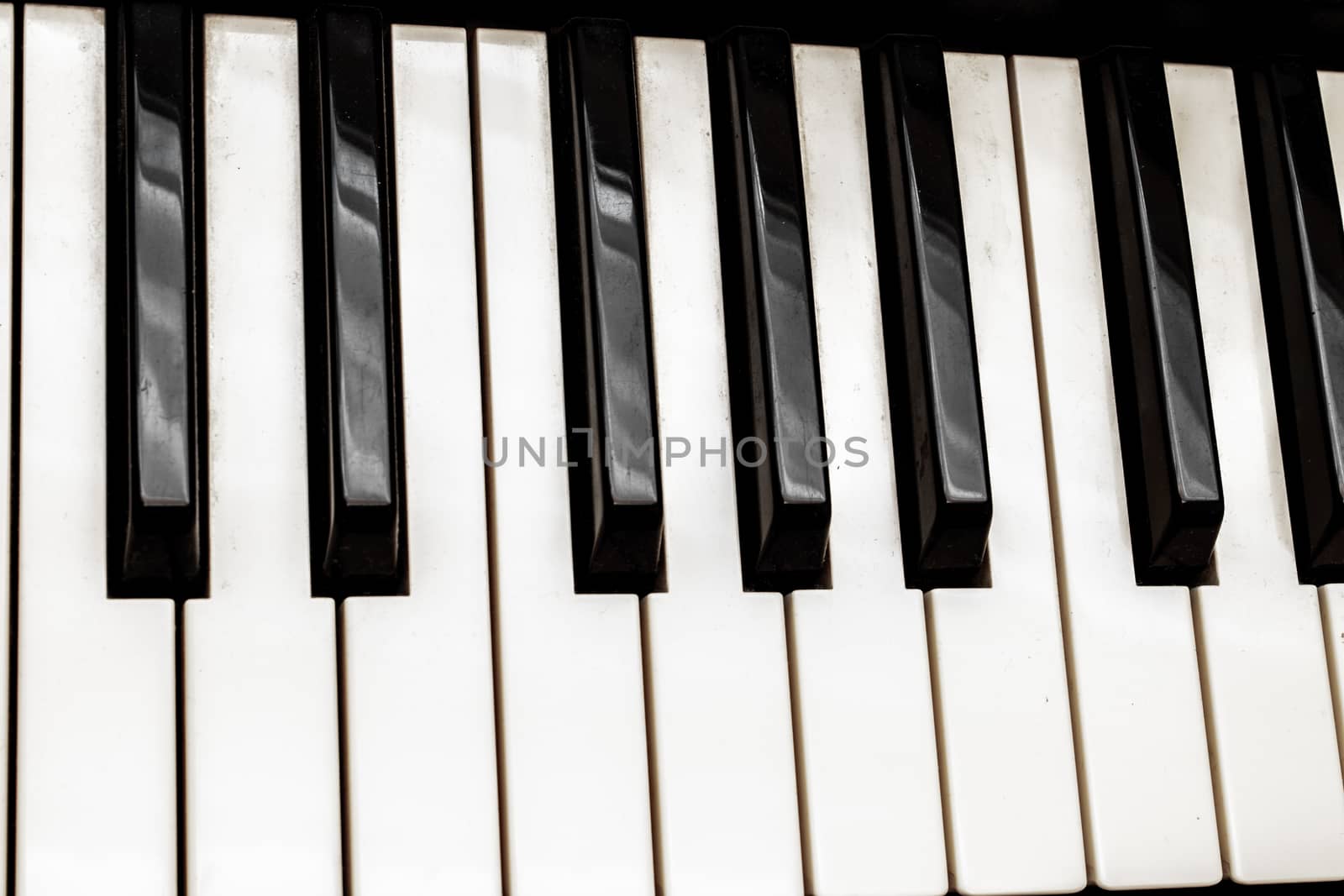Black and white piano keys. Musical instrument.