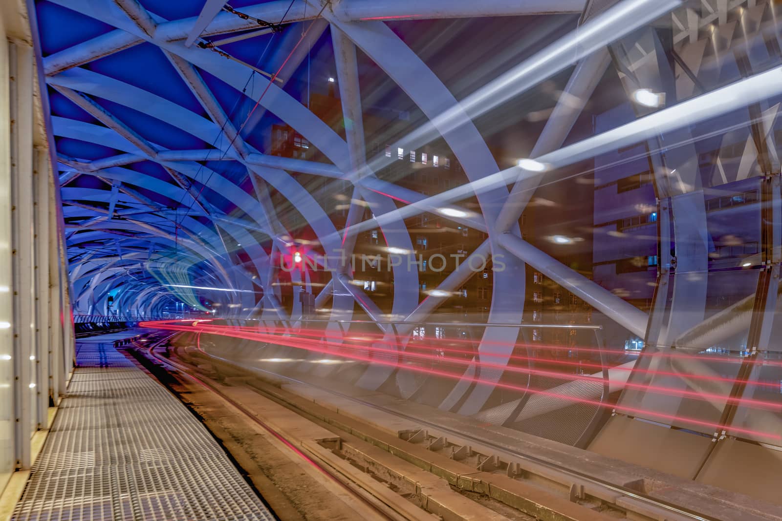 Long exposure of a tram leaving BeatrixKwartier tram station platform to the next station in The Hague, Netherlands by ankorlight