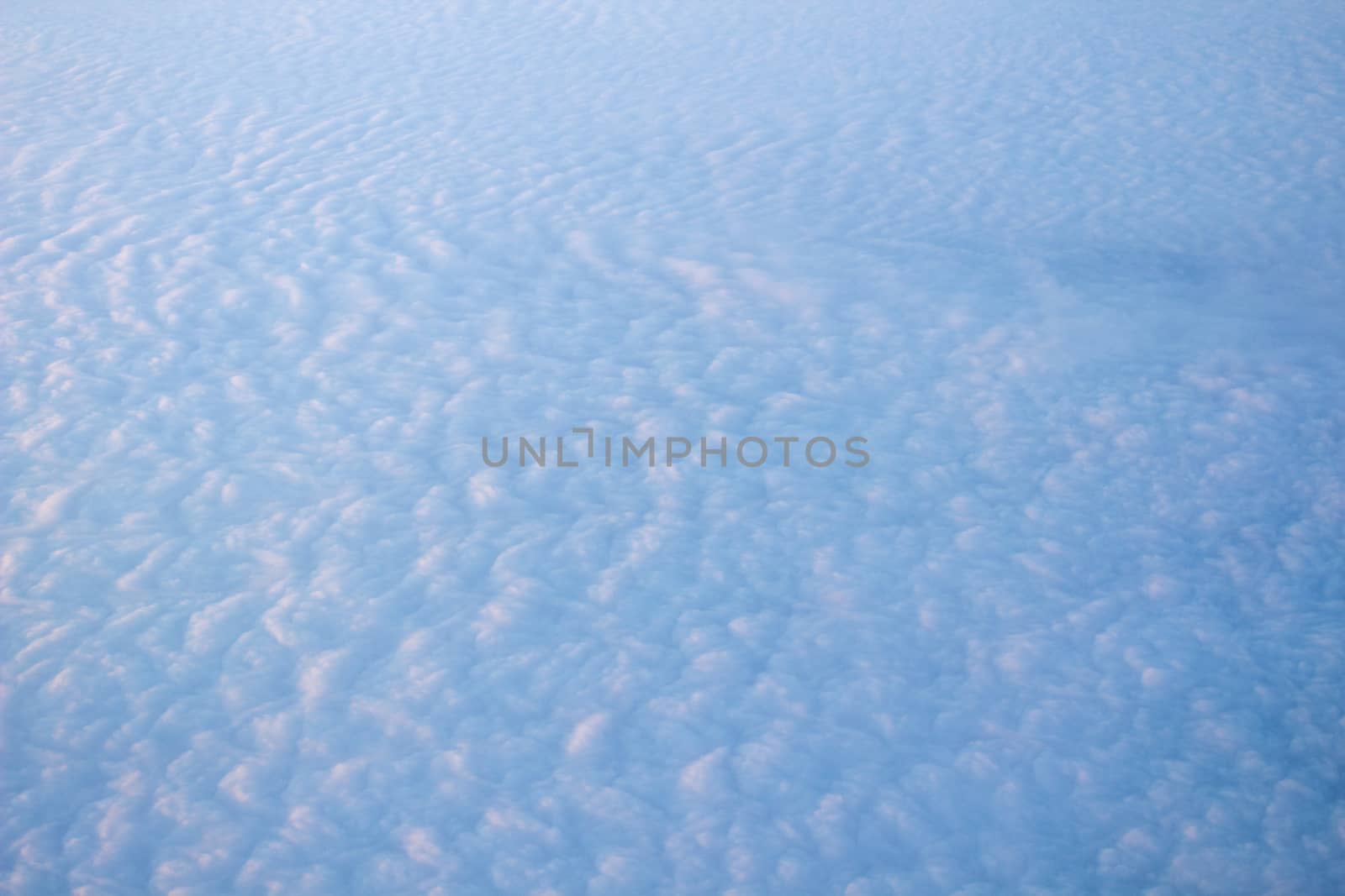 Wide cloud landscape aerial view from a plane.