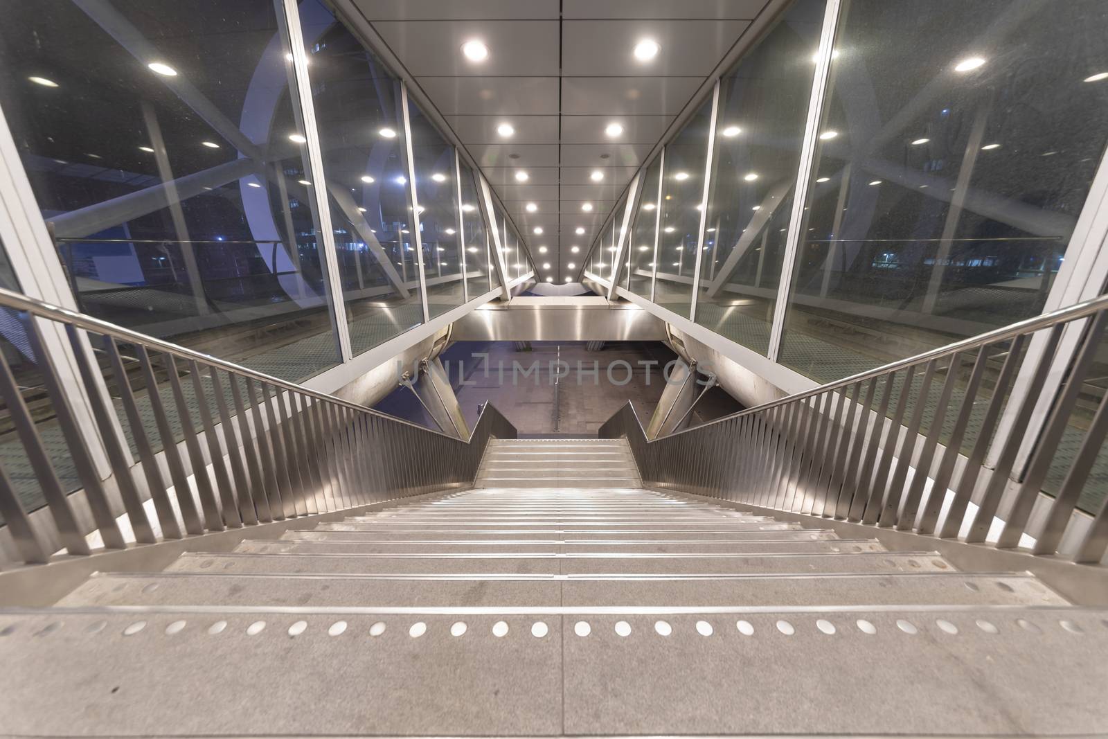 Beatrixkwartier (Beatrix district in Dutch) entrance East escalator getting out from tramway station in The Hague at night, Netherlands by ankorlight