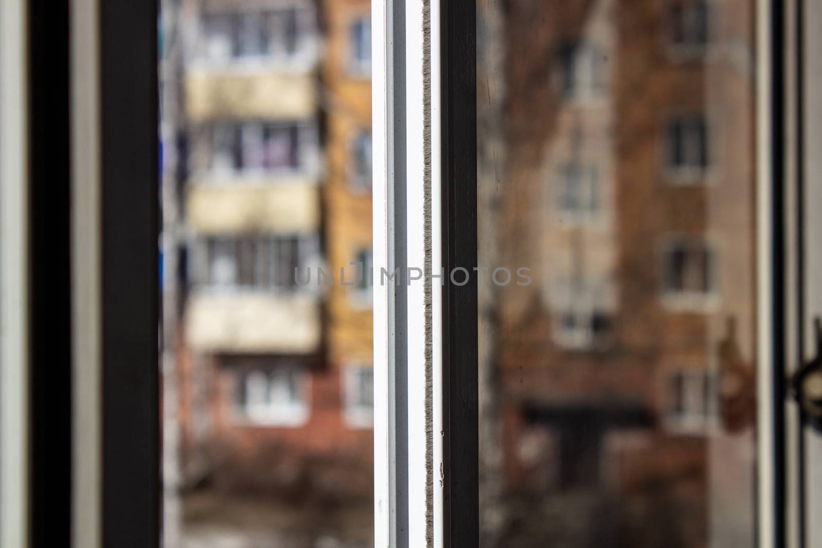 Open window of the balcony. Sliding white window