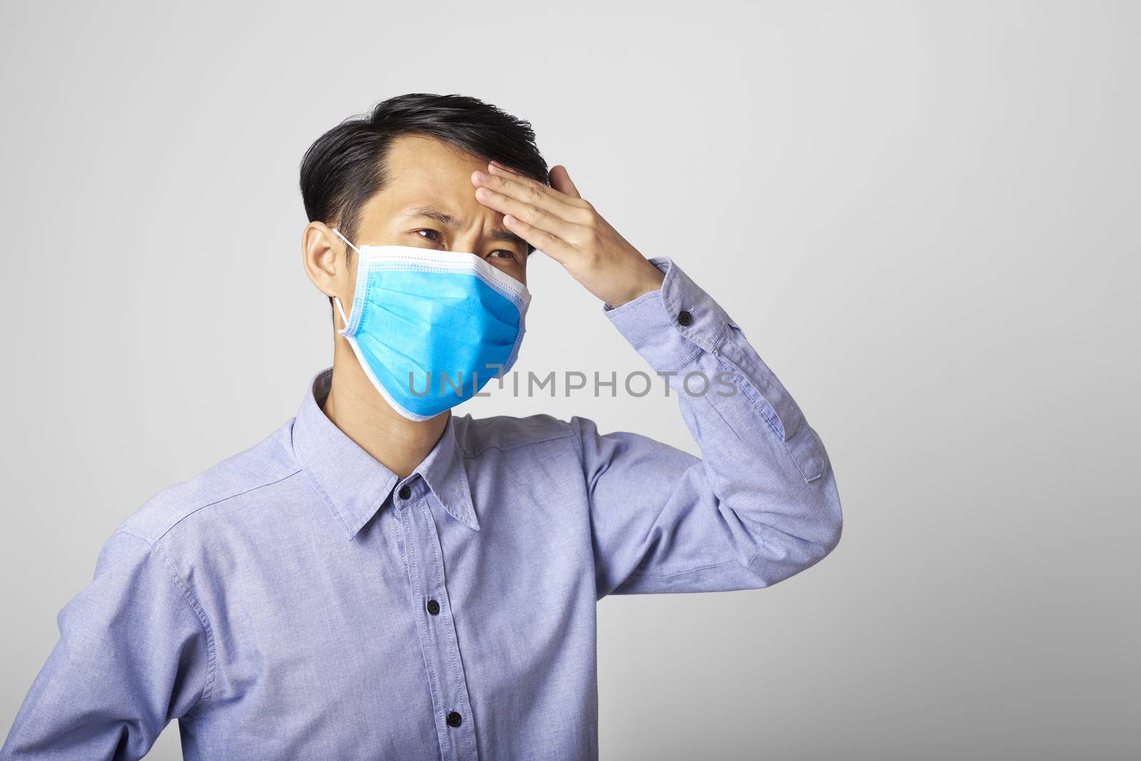 adult asia man wearing surgical mask covering mouth and nose with illness symptom flu.