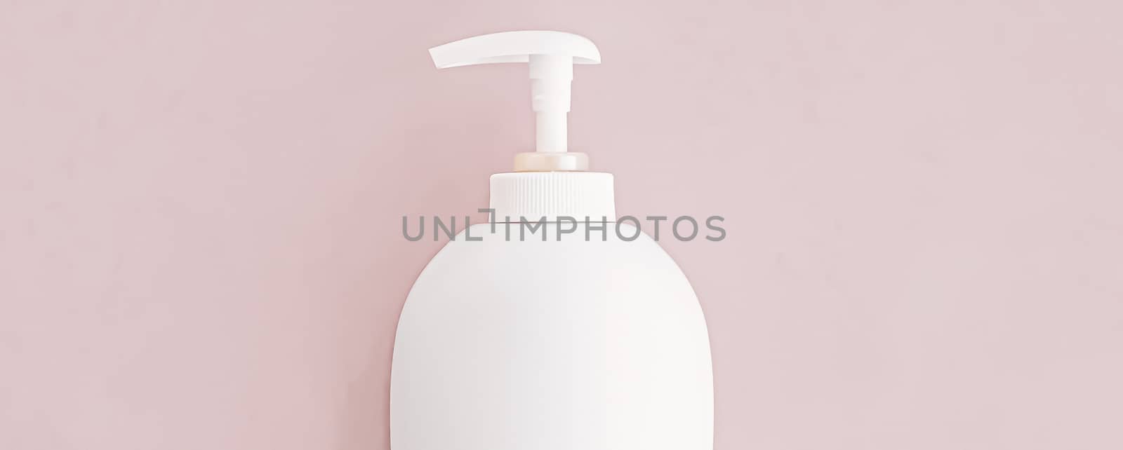 Bottle of antibacterial liquid soap and hand sanitizer on beige background, hygiene product and health care concept