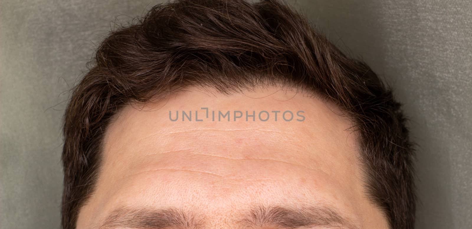 Forehead, upper part of a man's face by AnatoliiFoto