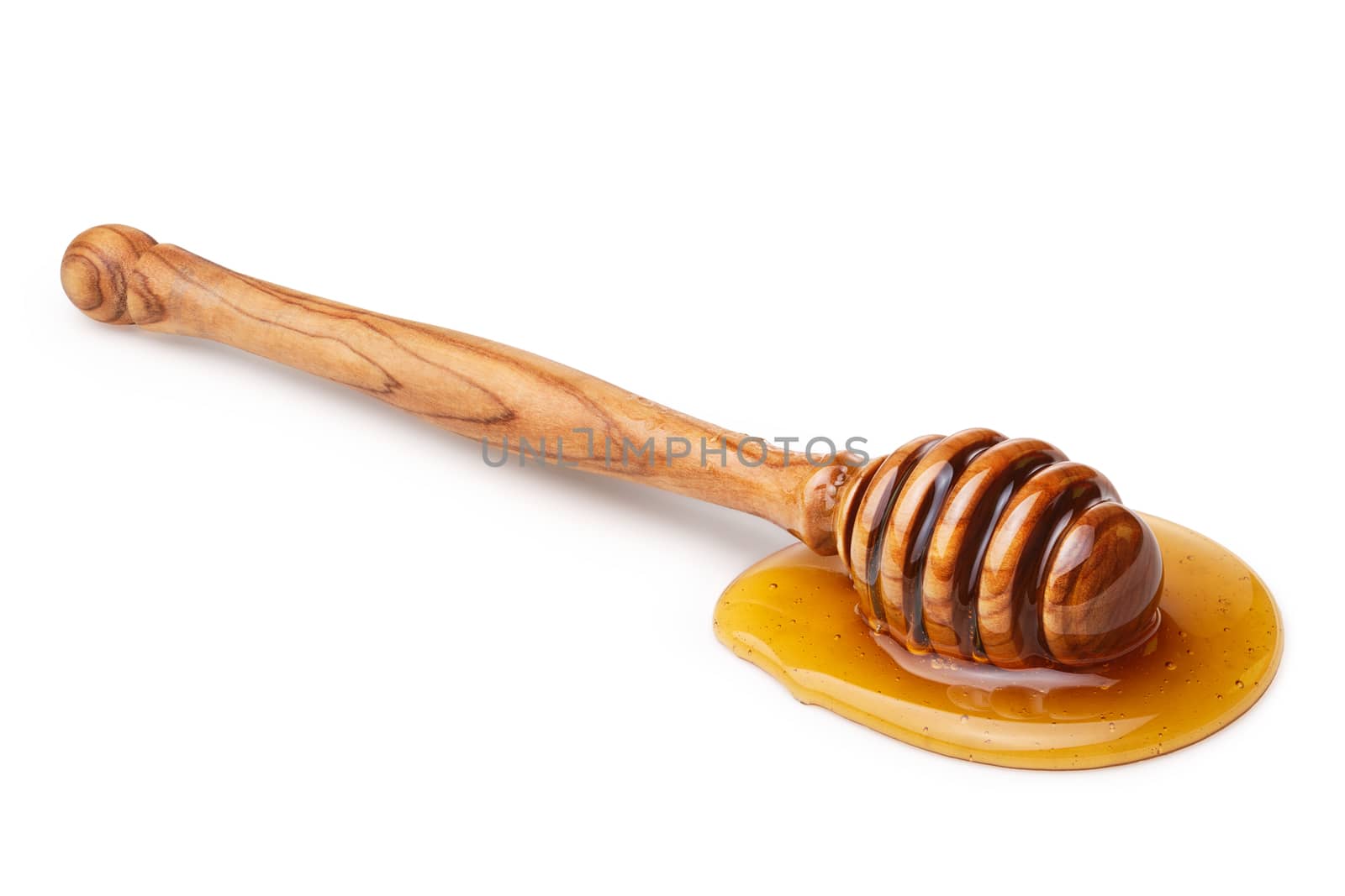 Wooden honey dipper with honey. Infinite depth of field,clipping paths