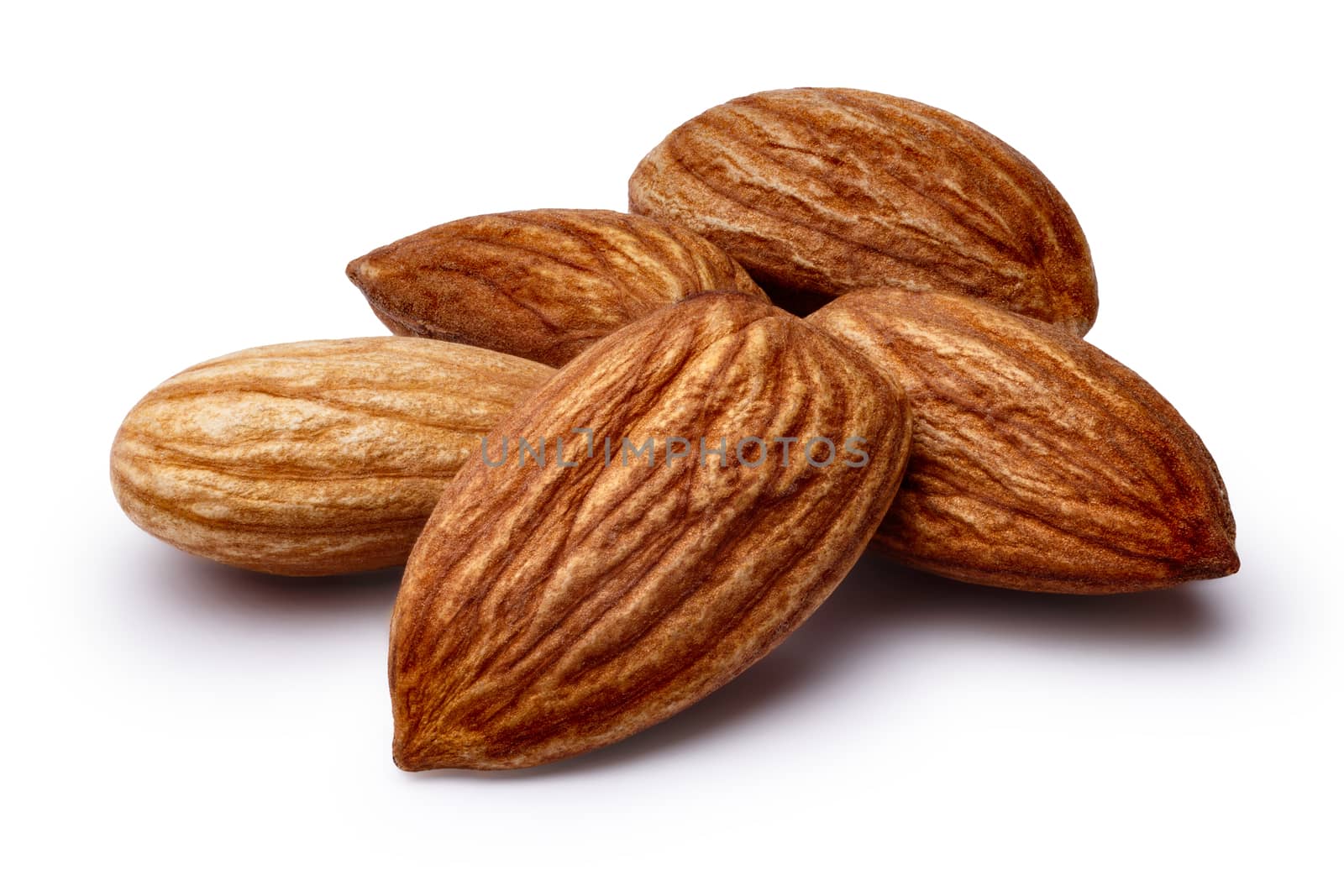 Heap of shelled almonds (fruits of Prunus amygdalus). Infinite depth of field,clipping paths