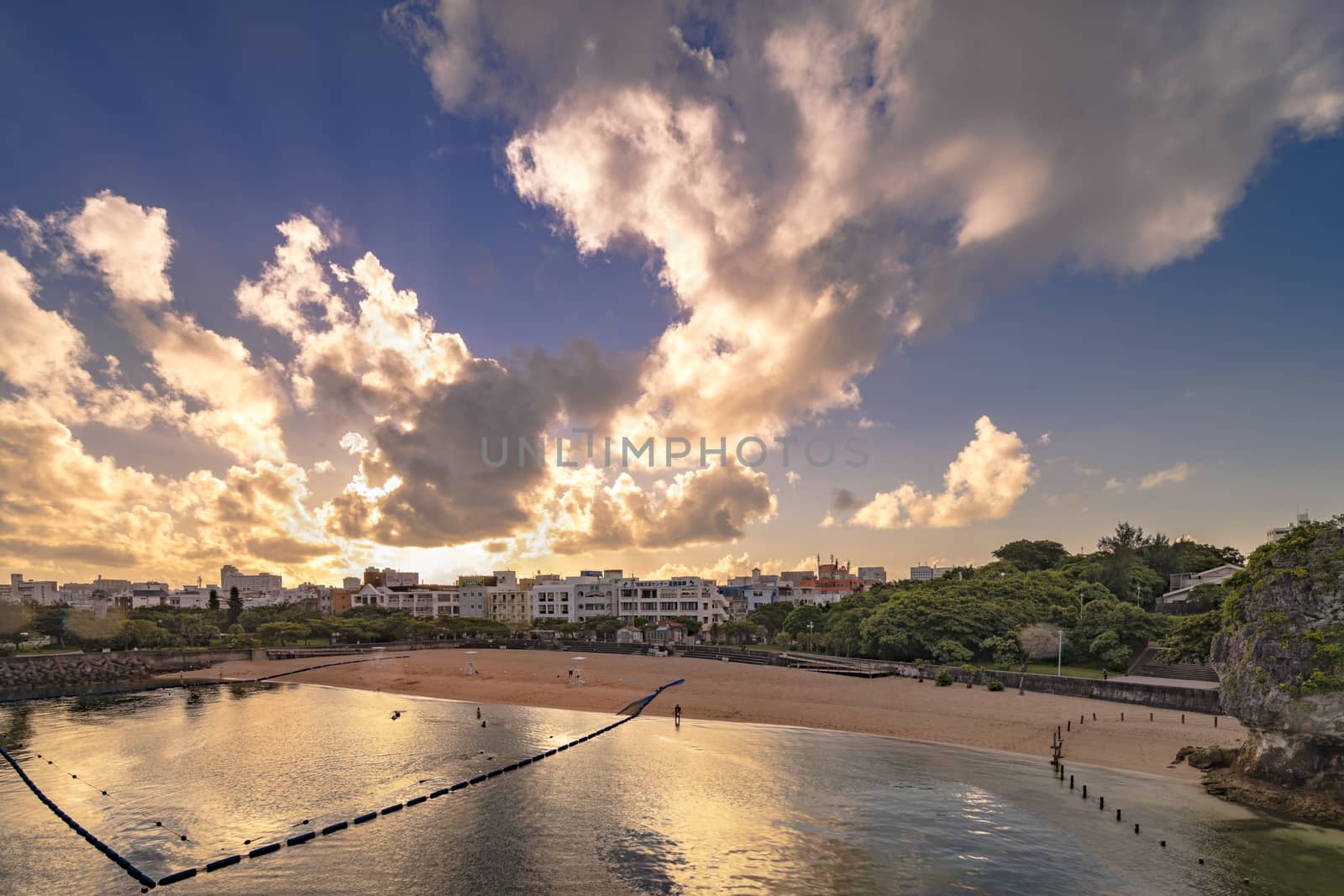 Sunrise landscape of the Naminoue beach close to the Kokusai Street Shopping District of Naha in Okinawa Prefecture, Japan.