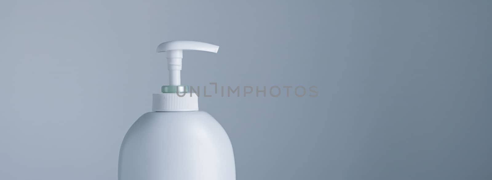 Blank label cosmetic container bottle as product mockup on gray background by Anneleven