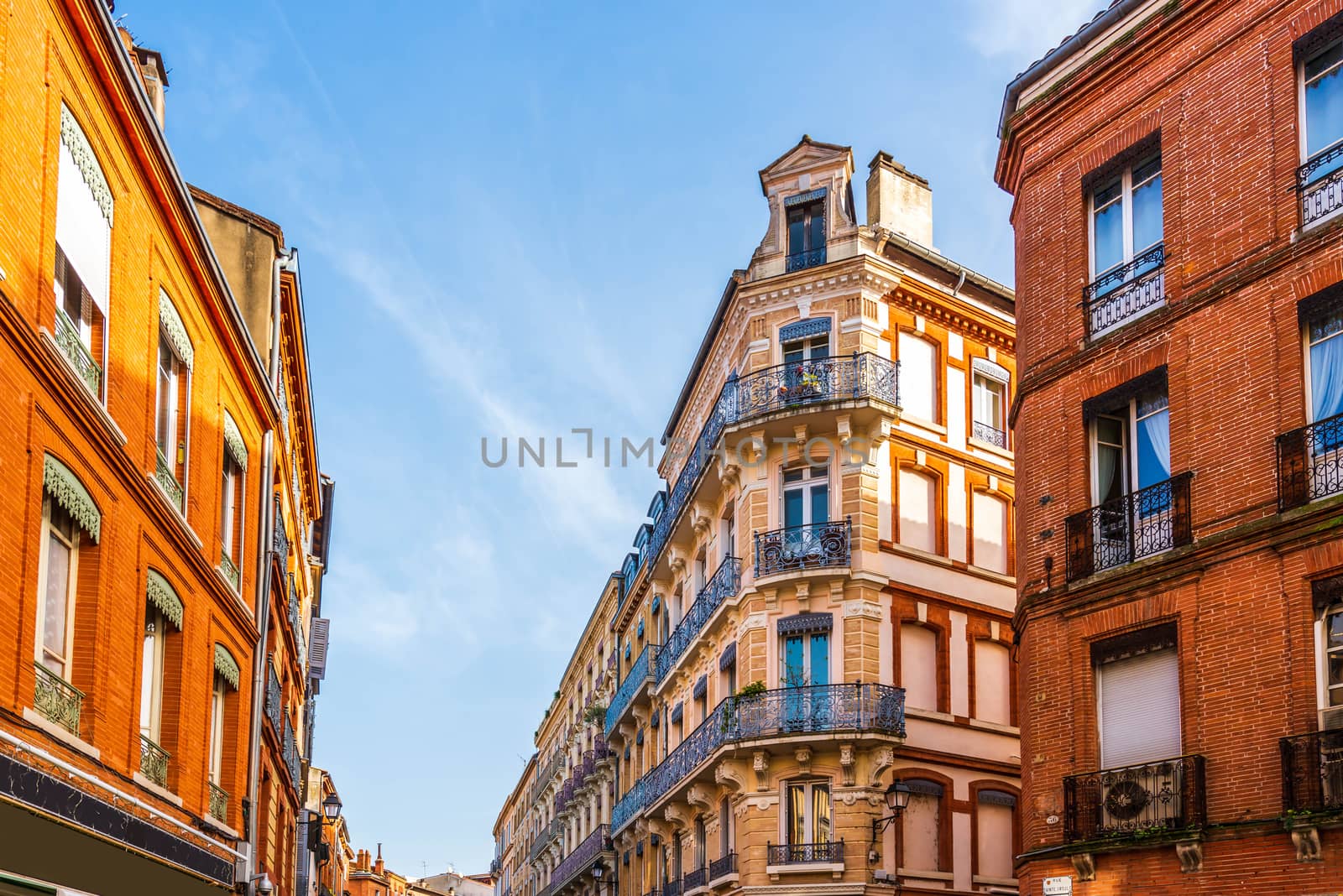 Typical building in Toulouse in Occitania, France by Frederic