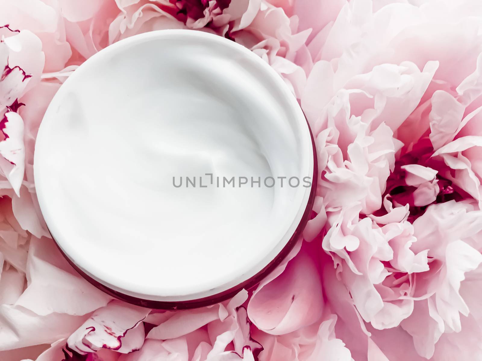 Face cream moisturizer on floral background as luxury skincare cosmetics, healthcare and beauty product by Anneleven